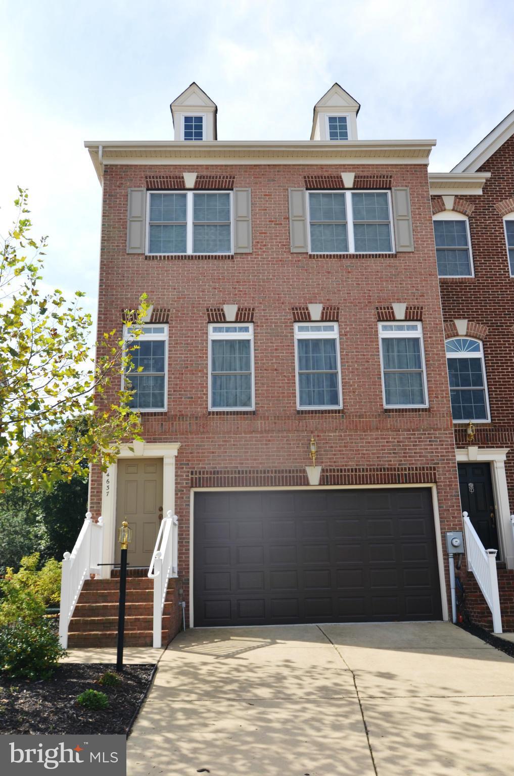 3BR 2FB 2HB four level end unit luxury town home. Each lvl has own rear deck backing to wooded privacy. Upscale kitchen w/ solid surface counter tops and center island. Master bath w/sep corner tub and shower. Open floor plan with lots of natural light. 2 car garage. Pets case-by-case. Occupant in process of packing. Available on, or about, 12/30/16.  No smoking in home.