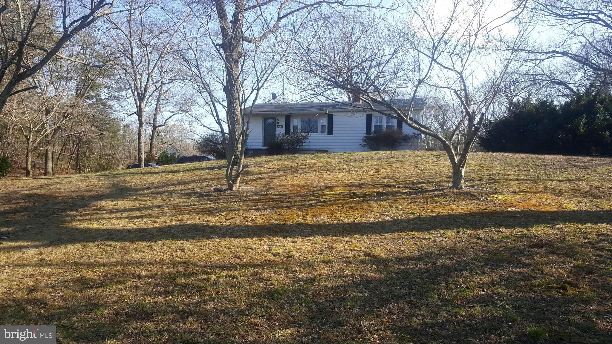 Great Place to Start - 1.3 Acres, 2 Car Detached Garage, No HOA, Updated Kitchen, New Carpet, Hardwood Floors, Living Room with Fireplace, Family Room in Basement, Lg Master with big Bay Window, updated baths, Awesome Deck and Firepit area, perfect for entertaining, newly paved driveway, laundry room with storage, ready to move in,