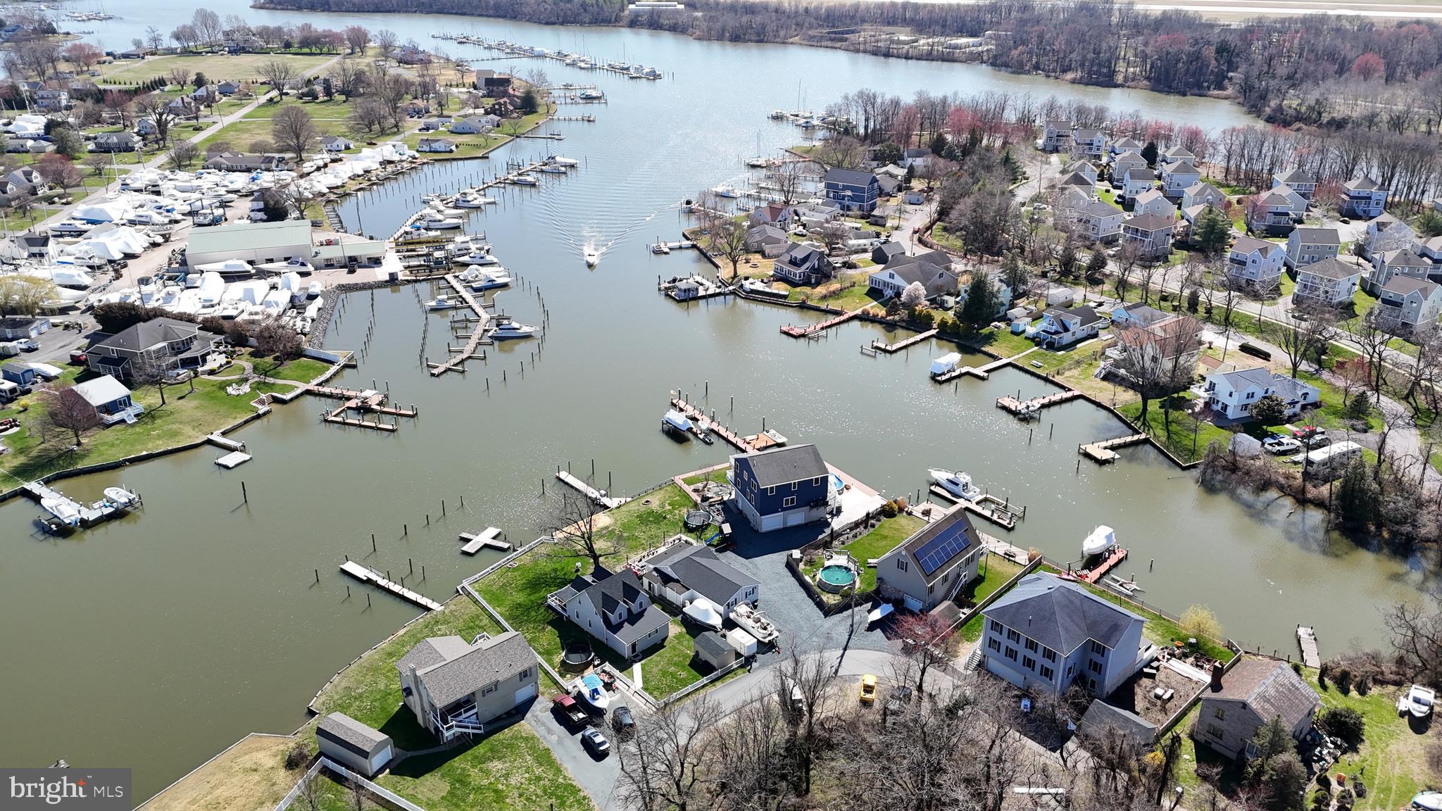 There are properties, and then there are locations. This is a location. Sitting directly on the shores of Middle River, this waterfront opportunity puts you right in the heart of one of the most sought-after water communities in the Baltimore area — where weekends are measured in boat rides, morning coffees on the dock, and sunsets that paint the sky in ways no camera can quite capture.
Step outside and you're on the water. A newer bulkhead keeps your investment protected, and a private dock extends right out to the river — tie up your boat, launch the jet ski, drop a line in the water, or simply sit and watch the world slow down. Middle River connects you to the Chesapeake Bay and all the boating, fishing, and crabbing that comes with it. This is the lifestyle people spend years searching for.
The views from this property are the kind that make you stop and take a breath. Whether it's the morning light dancing off the water, the boats drifting by on a summer afternoon, or those legendary waterfront sunsets rolling in over the horizon, this is a front-row seat to some of the best scenery the region has to offer. You simply cannot put a price on a view like this.
And when the sun goes down, the fun doesn't have to stop. Bengies Drive-In Theatre — one of the last great American drive-in experiences and a beloved Maryland landmark — is right around the corner. Catch a double feature and be back home on the water before the credits finish rolling. It's the kind of neighborhood detail that makes a good location a great one.
For the buyer with vision, this is the opportunity you've been waiting for. Waterfront lots with a private dock and newer bulkhead in this location are a rare find at any price point. Bring your ideas and your imagination — the water is already waiting.