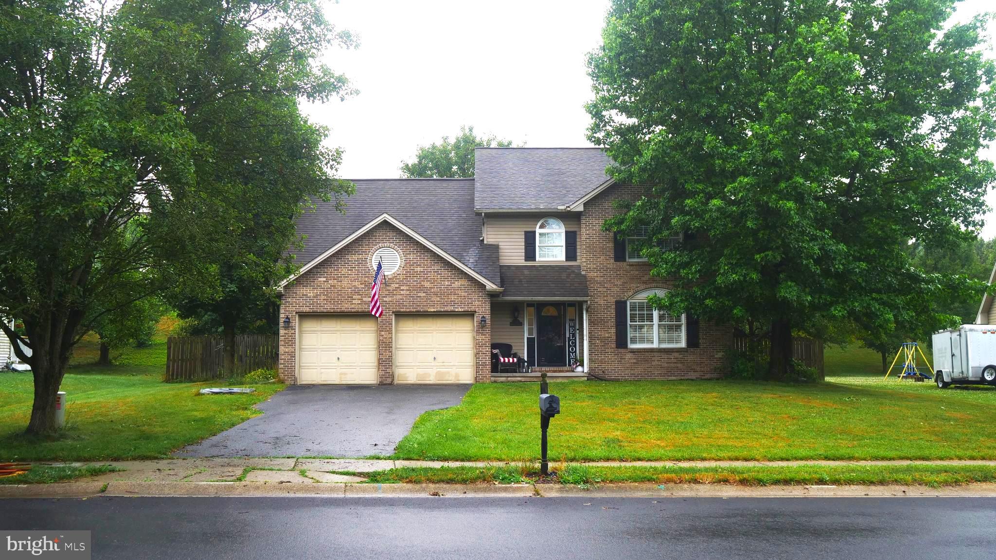 113 Woodview Drive offers the kind of space, setting, and everyday functionality that buyers look for in the desirable Westgate community of Mount Holly Springs. This well-cared-for home features 4 bedrooms, 2.5 bathrooms, an attached two-car garage, and a driveway with room for at least 3 additional vehicles.

The main level has an easy, practical flow. The living room sits just off the entry and connects naturally to the dining room and kitchen, creating a layout that feels comfortable for daily living while still working well when hosting. The kitchen includes a movable island, and the dining area provides direct access toward the yard. A gas fireplace in the living room adds a comfortable focal point to the space.

Upstairs, the primary bedroom includes a walk-in closet and its own full bathroom. Three additional bedrooms and a second full bathroom provide flexibility for guests, work-from-home needs, or additional living space.

The rear yard is fully fenced and offers a deck for outdoor dining, relaxing, or taking in the mountain views. The unfinished basement adds valuable storage and future-use potential, while the attached garage provides additional room for storage, yard equipment, tools, or workshop space.

Maintained by the same family for roughly 20 years, this home is move-in ready and offers a strong mix of space, location, parking, outdoor living, and scenic surroundings. Come see what makes 113 Woodview Drive a standout opportunity in Westgate.