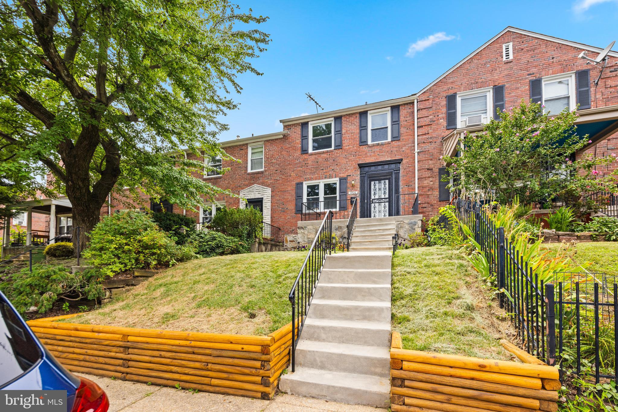 Welcome to this beautifully updated brick townhome in Baltimore's highly sought-after Ednor Gardens Historic District, where timeless character blends seamlessly with modern comfort and exceptional curb appeal. From the professionally landscaped front yard with new natural mosaic stone retaining walls to the private fenced backyard and detached one-car garage, every detail has been thoughtfully enhanced. Step inside to discover beautifully refinished hardwood floors, elegant crown molding throughout the living room, dining room, and kitchen, fresh paint, updated lighting, and a bright, inviting floor plan that is ideal for both everyday living and entertaining. The beautifully updated kitchen serves as the heart of the home, featuring new quartz countertops, new stainless steel appliances, updated cabinetry with modern hardware, contemporary fixtures, abundant storage, and direct access to the backyard—offering the perfect combination of style and functionality. Upstairs, you'll find three generously sized bedrooms, each with its own ceiling fan, along with an updated full bathroom featuring marble flooring, a new vanity, updated lighting, and modern fixtures while preserving the home's classic charm. The finished lower level provides exceptional flexibility and can easily serve as a family room, media room, home office, or playroom. A convenient half bath, laundry area, and additional storage complete the lower level. Step outside to enjoy a fully fenced backyard designed for relaxing and entertaining, complete with new exterior stairs leading to the lower level, rear alley access, and a detached one-car garage. Conveniently located just minutes from Morgan State University, Johns Hopkins University and Hospital, the VA Medical Center, downtown Baltimore, shopping, restaurants, parks, and major commuter routes, this exceptional home offers the perfect blend of historic charm, quality craftsmanship, and modern convenience. A rare opportunity to own a thoughtfully updated home in one of Northeast Baltimore's most desirable historic neighborhoods.