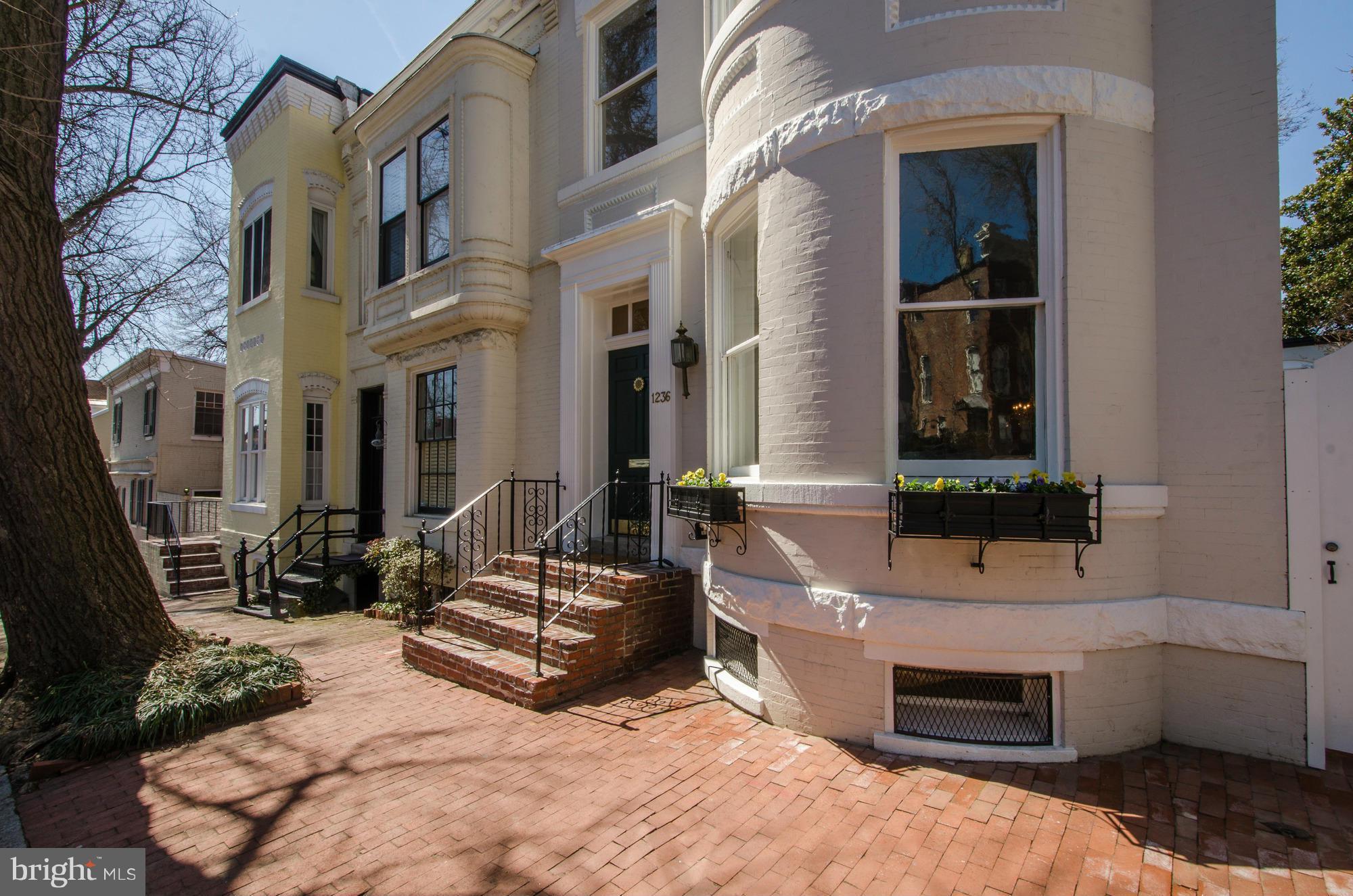 OPEN HOUSE Sunday 8/9 1-4 NEW PRICE!  Whole house renovation by award winning Glass Construction Co, 1890 Semi Detached Victorian PLUS separate two story finished Carriage House connected by enclosed walkway. Approx 4000SF of finished space,  Private garden and  courtyard. Gated PARKING for 2-3 cars.
