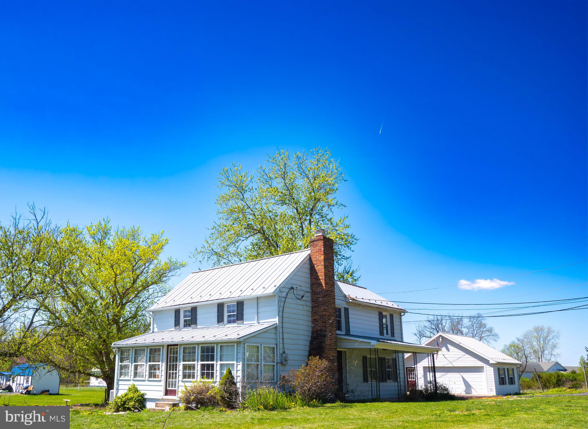 Welcome to this charming farmhouse offering timeless character and peaceful country living in Kearneysville! This home features classic details throughout with plenty of space to make it your own. You will fall in love with the exposed beams, built-ins, and spiral staircase. The home has true charm, and you'll feel it immediately! Situated on a spacious lot, the property also includes a newer driveway and detached garage, perfect for storage, hobbies, or workshop space. Enjoy the quiet without sacrificing amenities! Charles Town and Inwood are both only minutes away. Schedule your tour today!