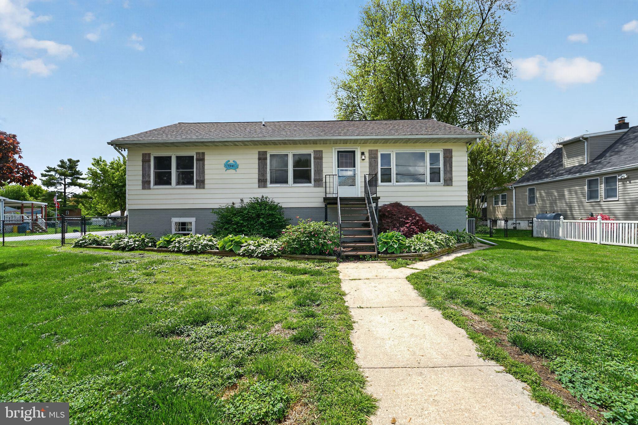 Welcome to 7341 Gunpowder Road in sought-after Oliver Beach, a charming water-oriented community. This spacious 4-bedroom, 3-bath home offers a large yard, huge basement, and thoughtful updates throughout. The kitchen and baths have been beautifully updated with granite countertops and stainless steel appliances. Major improvements include a roof replaced in 2022, some newer windows, a recently replaced and upgraded HVAC system, and a new water heater. Enjoy the Oliver Beach lifestyle with optional membership for just $65 per year, providing access to the community boat ramp and clubhouse.