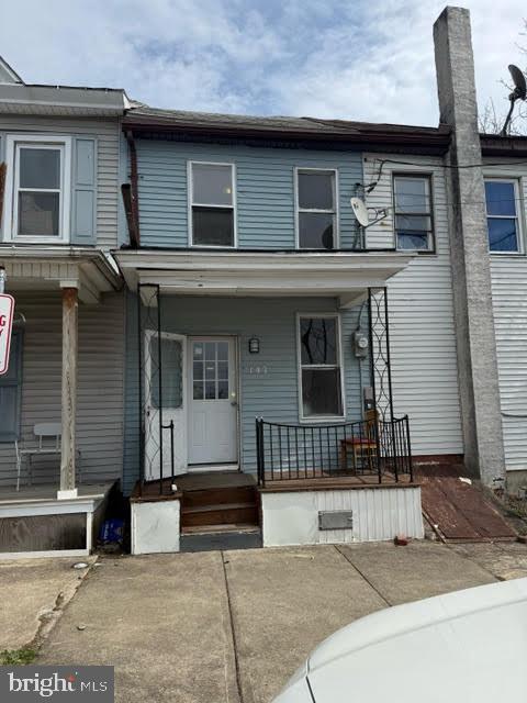 This 2 bed, one bath home has been updated with new floors and paint throughout, featuring  open living and dining rooms. Includes refrigerator and electric stove.  Home is heated with electric baseboards, on street parking.