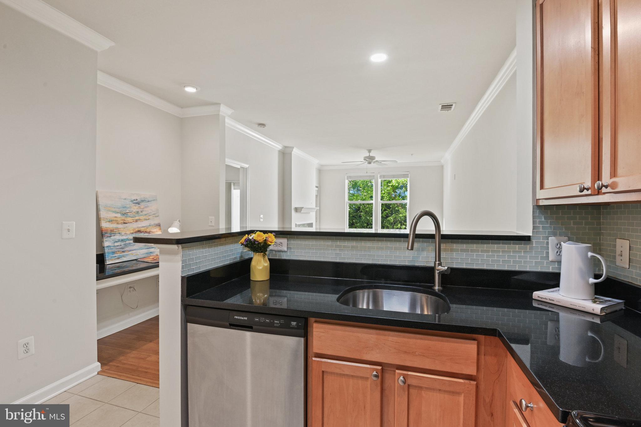 Welcome to 12000 Market Street #343 at The Savoy — a beautifully upgraded 1BR/1BA condo in the heart of Reston Town Center! This move-in-ready home is perfectly situated in a secure, amenity-rich building, offering the ultimate in location, luxury, and lifestyle.  Interior Features include Bamboo flooring, Granite countertops & stainless steel appliances, Gas cooking, Built-in desk, Full-size washer & dryer, Gas fireplace with mantel, Crown molding, Fresh paint throughout, Recently replaced HVAC, Ceiling fans, Private balcony with serene pool & courtyard views, and TWO reserved garage parking spaces. WOW!  Truly turn-key!  You will enjoy the many community amenities at The Savoy including a FOB-secured entry & concierge service, outdoor pool & landscaped courtyard, Grilling areas, 
Fully equipped Fitness center, Business center, WiFi/computer and meeting room, Game room, Media room, and Party spaces!  The location is unbeatable! Live steps from Reston Town Center’s premier shops, restaurants, and entertainment. Less than a mile to the Silver Line Metro.  Easy access to Fairfax County Parkway, Dulles Toll Road, Route 28, and Reston Parkway. Just 7 miles to Dulles International Airport. Whether you're working from home, commuting to the city, or enjoying everything RTC has to offer—this is the perfect place to call home. Don’t miss your chance to live in one of Reston's most desirable communities!