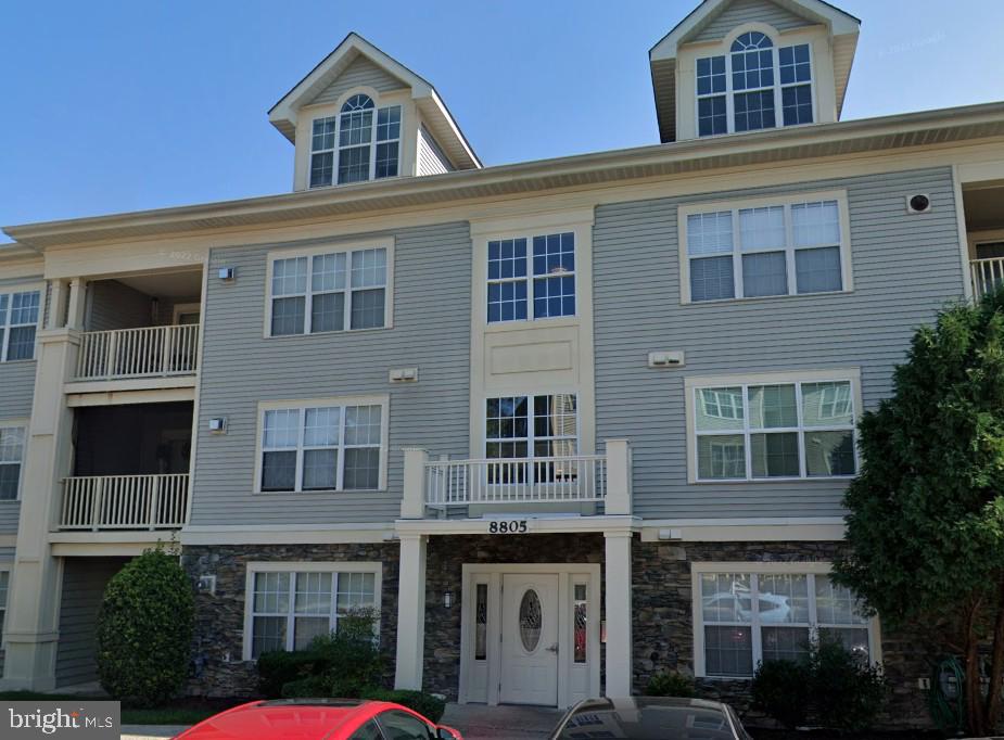 Experience comfortable, low-maintenance living in this beautifully designed top-floor condominium located in the heart of Pikesville. This 2-bedroom, 2.5-bath home features soaring vaulted ceilings that create an open, airy feel throughout the main living areas. The inviting living room is highlighted by a cozy gas fireplace and provides direct access to a private balcony, perfect for enjoying your morning coffee or relaxing at the end of the day.

The well-designed floor plan includes a generously sized primary suite with a walk-in closet and a private full bath. Upstairs, a large loft offers flexible space for a home office, family room, or guest area and includes a convenient half bath and in-unit washer and dryer.

Located in a secure-entry building, this home offers both peace of mind and low-maintenance living. Ideally situated near shopping, dining, and entertainment, with quick access to Interstate 795 and I-695, commuting throughout the Baltimore metro area is a breeze. Don't miss this opportunity to own a bright and spacious top-floor home in a highly convenient location.  Mortgage savings may be available for buyers of this listing.