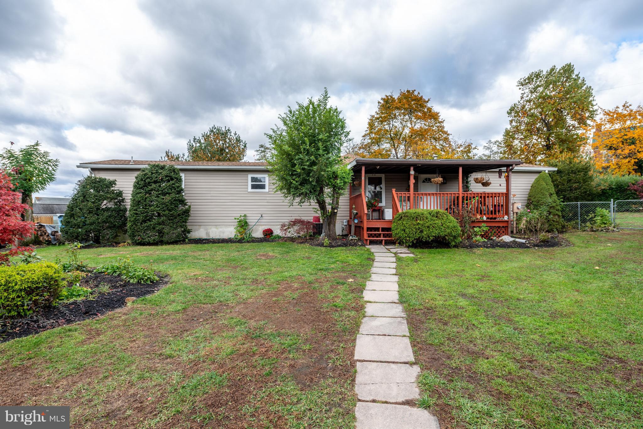 3BR/2BA mobile home with stick built addition on its own lot in Bermudian Springs SD. Located on a cul-de-sac with off-street parking (large driveway). Inside you'll find an open concept main living area w/ vaulted ceilings in LR/Kitchen. Kitchen/Formal DR/Family Room all has ceramic tile flooring. Dining Room has a woodstove & a sliding door leading out to a deck overlooking the backyard. Convenient main floor laundry room. Master BR has vaulted ceiling & an attached full bath. Additional two bedrooms & another full bath. Outside you'll find a level, fenced backyard & storage shed. Covered porch & deck. A nice place to call home- schedule your showing today!