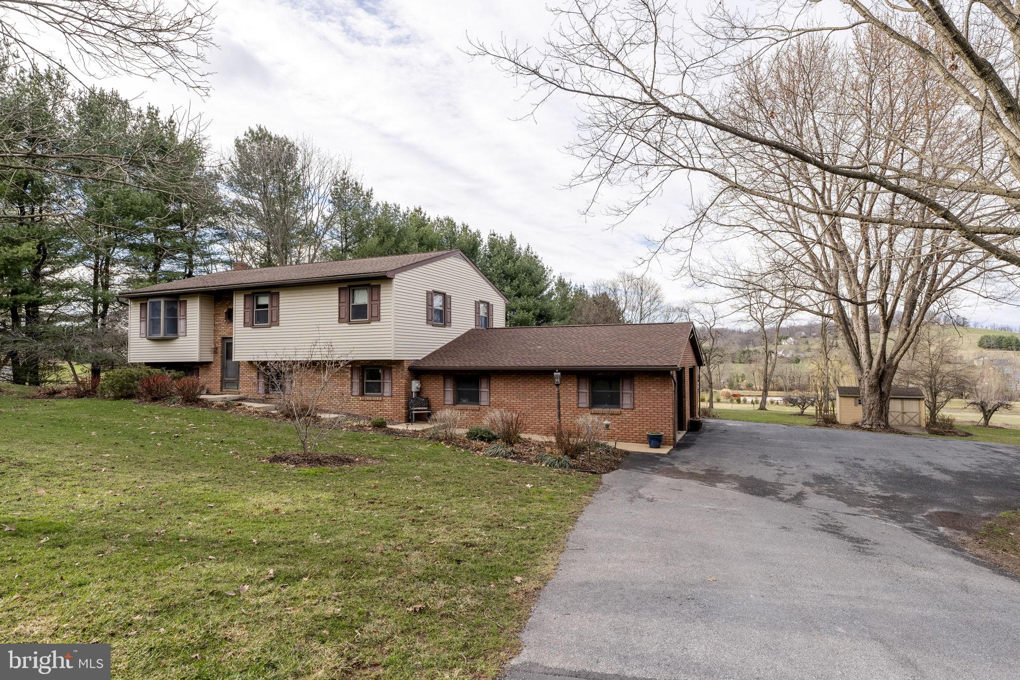 AUCTION PROPERTY.  AUCTION DATE- SATURDAY, June 13th @ 10AM.   Listed price is opening bid price only and is not indicative of the final sale price. Property must go to auction. TERMS:  10% down day of auction, balance 60 days or before.  Buyer pays both transfer taxes (2% of sale price).  REAL ESTATE: Rural one owner split foyer w/1903 SF finished area, eat-in kitchen w/raised oak cabinets & updated appliances, sliding door to covered screen deck/porch, living room, 3 bedrooms, 1 ½ baths, family room w/Harman coal stove, bonus/rec room, laundry, utility room, electric baseboard heat, coal stove, central AC, attached brick 2 car garage 26x28, low maintenance exterior w/covered soffit, fascia & Harvey insulated/tilt windows all on country 3.3 ACRE lot w/garden, lawn, fruit trees, future pasture area & utility building 263’ frontage on Horse Happy Rd.  Ideal rural acreage property.  ZONED AG.  NOTE: After 42 years, owners downsizing & serious to sell.  Elco schools.  Ideal location.  Minutes to Kleinfeltersville, Cocalico, Schaefferstown & Middle Creek Wildlife area.  A must see property to appreciate. OPEN HOUSE DATES: Saturday, May 23, 30 & June 6 from 1 to 4PM.