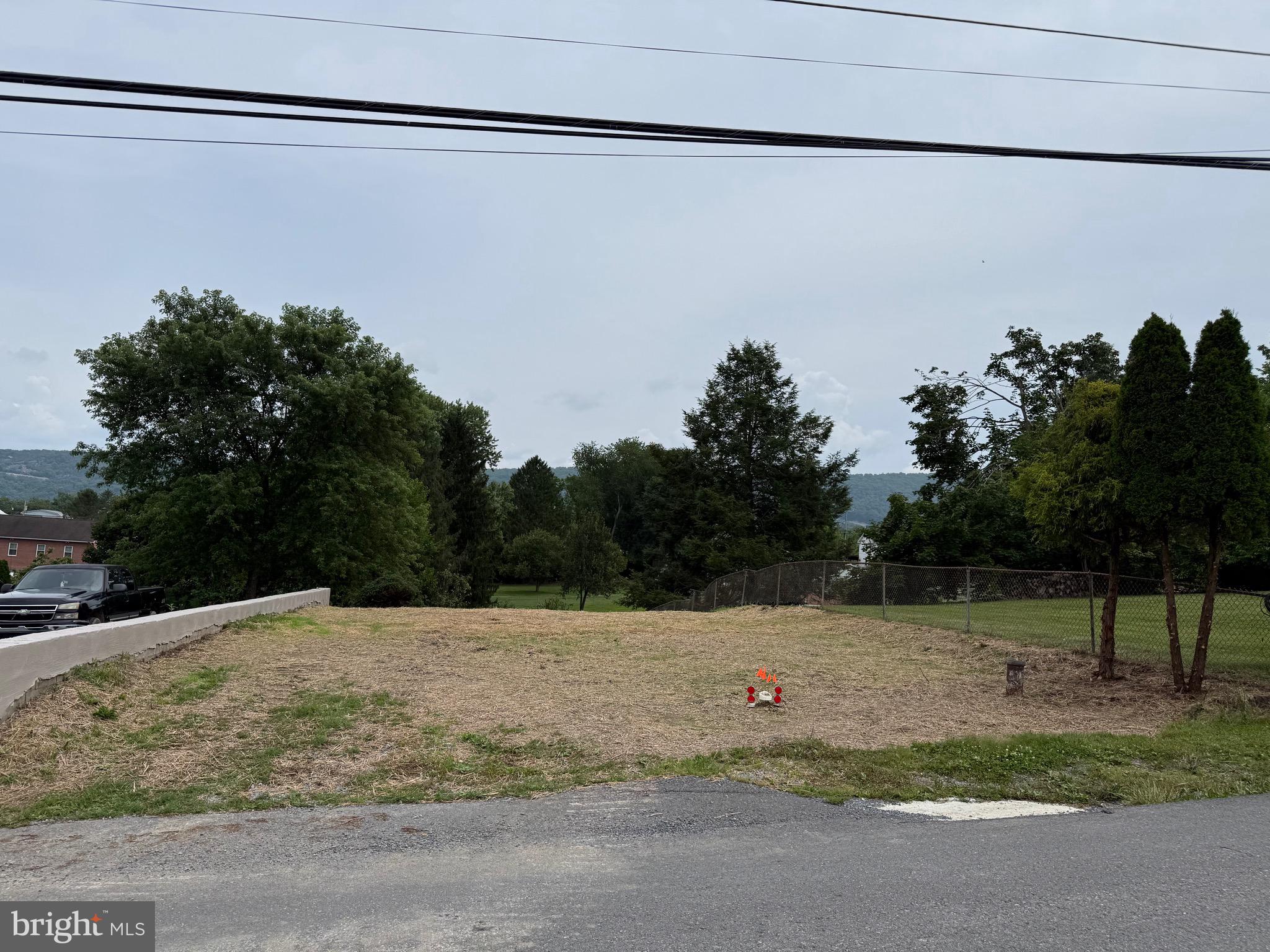 Just What You Have Been Looking For!   This lot is unrestricted so it would be great for a mobile home or even your RV.   .11 acre with a well and public sewer hookup.   It will need electric which is right by the property.     Call now!   This won't last long.