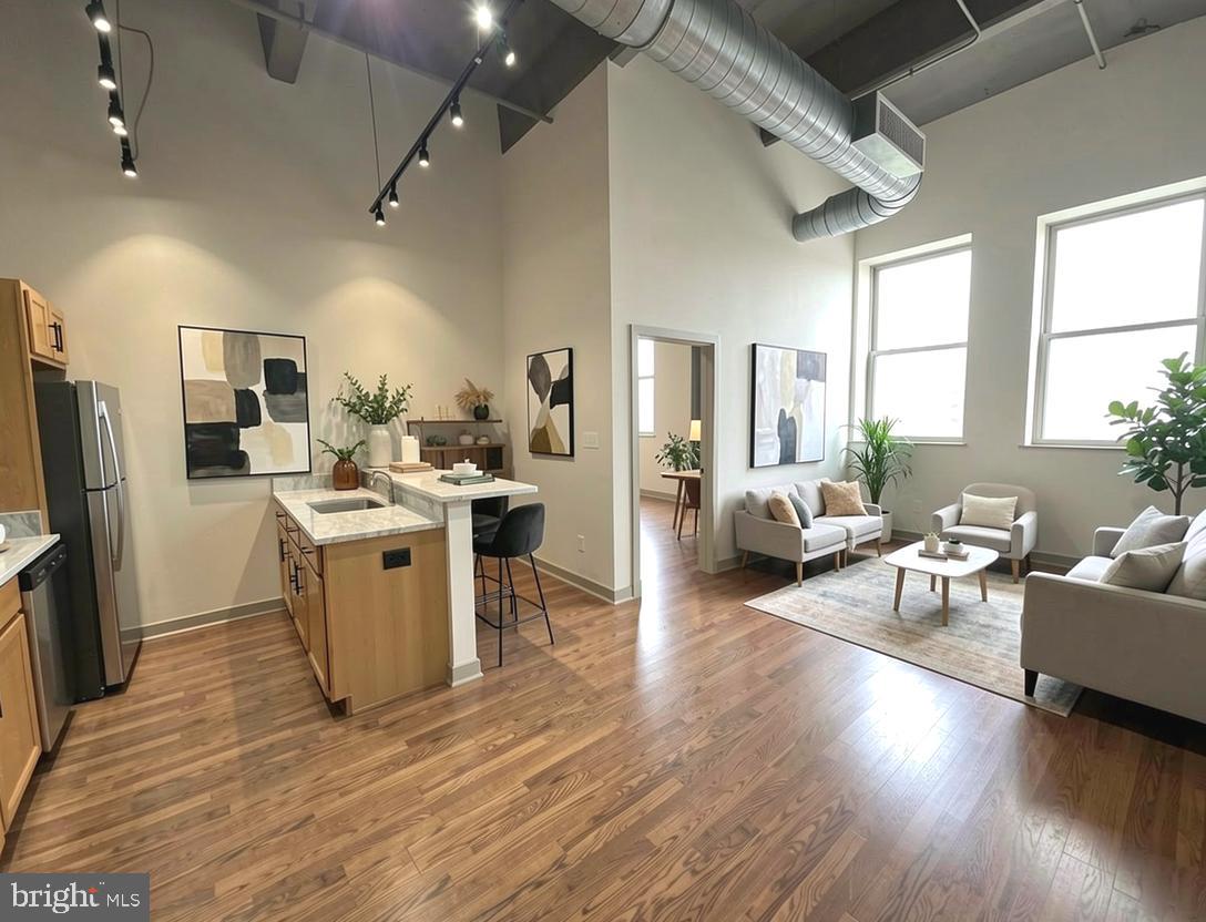 10th -floor 1b/1ba condo in Spring Garden featuring soaring 15 ft ceilings,  sweeping  city views, brand-new central air, and brand-new stainless steel appliances.  This bright, turn-key loft offers an open floor plan with granite countertops, generous closet space, an in-unit laundry hook up, and a private basement storage unit. 
 -Unbeatable Location and Value: Condo fees covers heat, water, and gas (you pay only electric).  
-Perks: Located directly across the street from the flagship Giant grocery store.  Steps from world-class museums, parks, dinning and transit.  High walk/bike scores.
-Seller incentive: the building has a $389/mo assessment through 2032 for capital improvements.  Seller is offering a $4,608 closing credit to fully cover your first year!