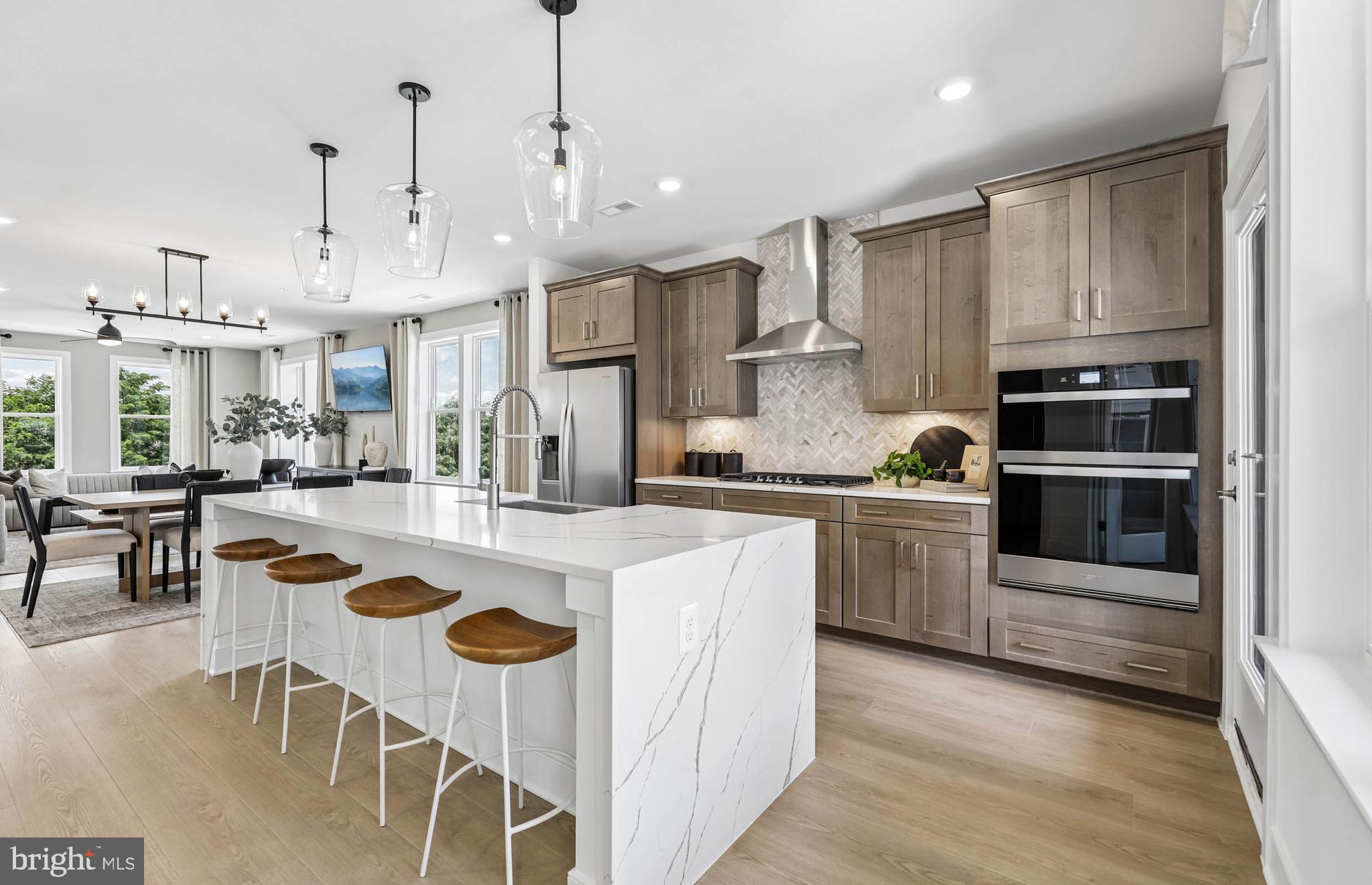 "Pulte's newest Montgomery County community- Watkins Mill Station is now open for sale.  Lot 28 features a July/August 2026 delivery and is complete and ready to tour.  Advertised price includes all upgrades.  Included kitchen layout with Whirlpool stainless steel appliances, gas range, microwave and dishwasher.  Sonoma Linen White kitchen cabinets with Carrara Morro Quartz countertops.  4"" x 12"" tile backsplash.  All Oak stairs with 7"" plank Honey Gold flooring main level and upper-hallway. Covered rear porch. Our thoughtfully designed two-level Sydney floor plan offers over 2,600 square feet of spacious living—larger than many townhomes. The main level features an open and inviting layout, highlighted by a covered porch just off the kitchen, perfect for seamless indoor-outdoor entertaining. A formal dining area and generous gathering room provide plenty of space for hosting, while a versatile corner office or flex room adds functionality. A walk-in pantry completes the well-appointed kitchen area.

Upstairs, the owner’s suite serves as a true retreat, offering ample space for a king-size bed, two large walk-in closets, and a luxurious en-suite bath with double vanities, a linen closet, and a private water closet. The upper level also includes two spacious secondary bedrooms, a convenient laundry room, and a hall bath with double vanities—designed to comfortably accommodate family and guests alike.                                                                                                                                                                                                                                           Stop by and tour Pulte's newest Montgomery County community and our newly decorated model homes.  Watkins Mill Station will offer a modern fitness center, seasonal pool, covered pavilion and tot lot.  This location is a commuters dream with walking access to the MARC train and just minutes from 270.  Live within the vibrant tapestry of the 270 corridor with access to Kentlands, RIO and Downtown Crown just minutes away, inviting you to explore, dine, and savor life’s little pleasures.  TO TOUR OUR DECORATED MODEL, PLEASE VISIT OUR SALES CENTER LOCATED AT - 506 PARKVIEW AVENUE, GAITHERSBURG, MD."
