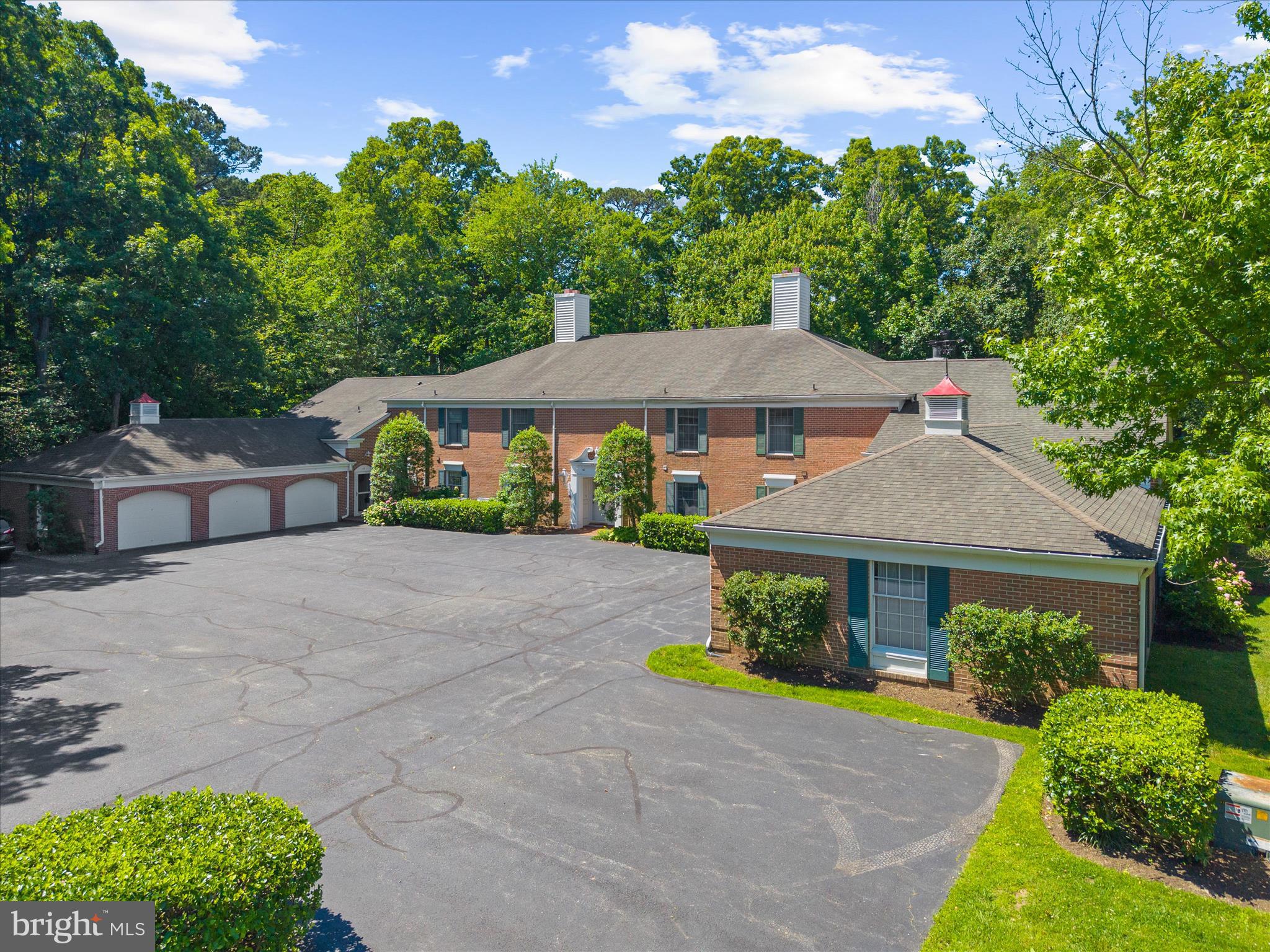 Want to live close to Historic Saint Michaels in a beautiful and low maintenance setting offering ample first floor living? Welcome to 24375 Widgeon Place, Unit 37, nestled in the picturesque Martingham Community just outside Historic St. Michaels . 

This desirable END UNIT property is the epitome of style and comfort, encapsulating all the charms of eastern shore coastal living.  Featuring 3 stunning bedrooms with 3 full bathrooms, offering generous living spaces and functionality, the property overlooks the beautiful Links of the Perry Cabin Golf Course, blending indoor comfort with  outdoor beauty. After you enter the vestibule/covered entryway, you're greeted by the foyer leading into the open living room area, which offers an inviting atmosphere, all new LVP flooring, a convenient wet bar, Bose sound system, and an electric fireplace, then unfolds into the dining area featuring  grasscloth wallpaper and is perfect for hosting social gatherings. Off the dining area is a well-appointed kitchen with hardwood floors and outfitted with Bosch stainless steel appliances, solid wood cabinets, ample storage, and a stackable washer and dryer area. The Anderson sliding glass doors are only a few years old and lead  to a private patio.  It only gets better with two spacious  primary bedroom suite options, one on the first floor boasting a  private sitting/office area, and the second  upstairs featuring its own private balcony with new trex decking, and wonderful views of the golf course. The 3rd bedroom on the second floor is large and spacious as well and storage will never be a problem with a walk-in attic off the large closet to accommodate your needs. 

NOTE: A portion of the garage was utilized to expand the first floor primary by prior owners, so the garage presently is suitable for storage and/or a golf cart. There is unassigned outdoor parking.  If you wish to convert the storage/golf cart sized garage back to a full one car garage, that is feasible without losing a main floor bedroom (ask listing agent for details). 

Additional upgrades: entire HVAC replaced approximately seven  years ago, a roof installed in 2011, two year old spout/gutter guards (gutters are cleaned by HOA),  and a lower deck/patio area built approximately eight years ago, and a long list of recent upgrades (past two yrs): Replaced the flooring throughout the condo (except kitchen)--so both levels--with a high quality LVP.  The stairs were redone in oak.  The kitchen floor is hardwood; Replaced (or added) new overhead light fixtures and ceiling fans throughout the unit, including adding under cabinet lighting in the kitchen and a utility closet light; Upgraded all electric outlets throughout the unit (they were original to the unit and the electrician advised it); Replaced the second floor balcony/deck with new roofing materials (underneath as it's essentially a flat roof so has all the components of roofing except for shingles) and new Trex decking materials;Put in  new downspouts off the rear of the unit; Every room was painted in muted coastal colors with the exception of the first floor bathroom which has a nautical stripe wallpaper; Upgraded window treatments (the cellular shades, curtain rods and curtains will convey if the buyers want them).

Whether it’s a weekend getaway situated on a golf course and near Historic St Michaels' renowned shops and restaurants  or a forever home you seek, this property is a tremendous blend of a vibrant community spirit and a tranquil, coastal life.