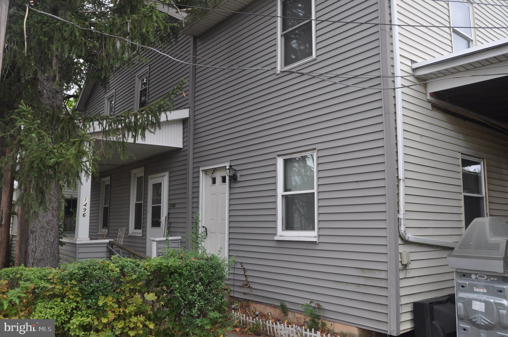 Large 2 1/2  story residential dwelling over 2,200 square feet in size. Second floor with 4-5 bedrooms. Walk-up attic with two finished rooms. Vinyl siding, oil heat, on 0.59 acres. Four parcels of land under one deed.
Includes a commercial one-story brick building over 2,300 square feet in size.