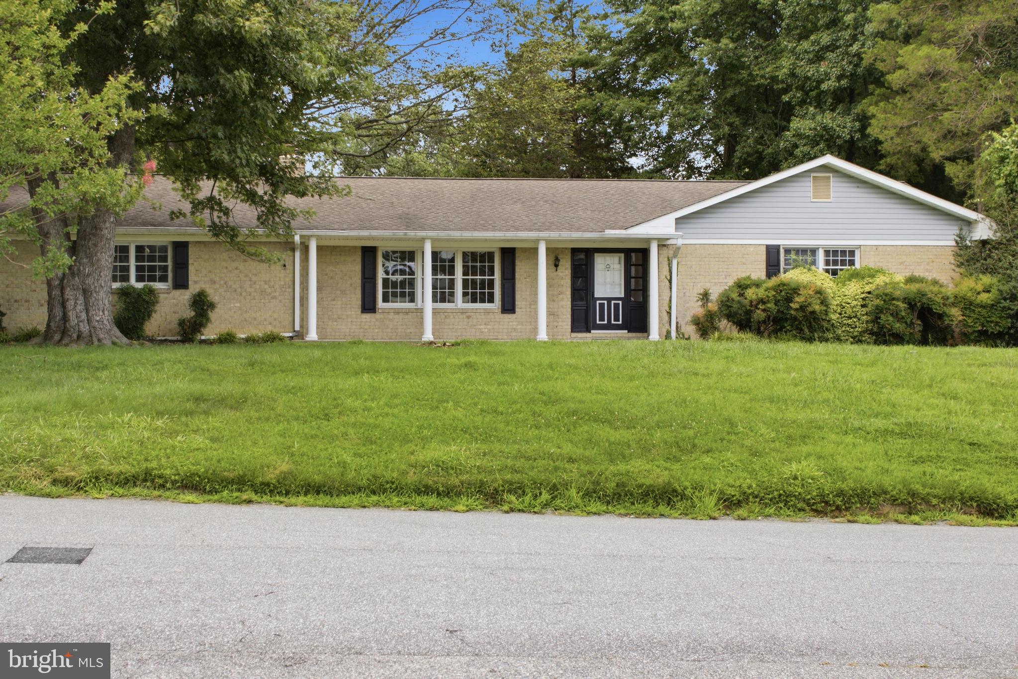 Welcome to this charming 3-bedroom, 2-bath ranch-style home offering comfortable one-level living with additional space in the partially finished basement. Inside, you'll find bright living areas, a functional layout, and spacious bedrooms. Enjoy the screened-in porch overlooking the backyard—perfect for relaxing or entertaining—as well as the convenience of an attached garage. Conveniently located near shopping, dining, parks, schools, and major commuter routes, this move-in ready home is one you won't want to miss!