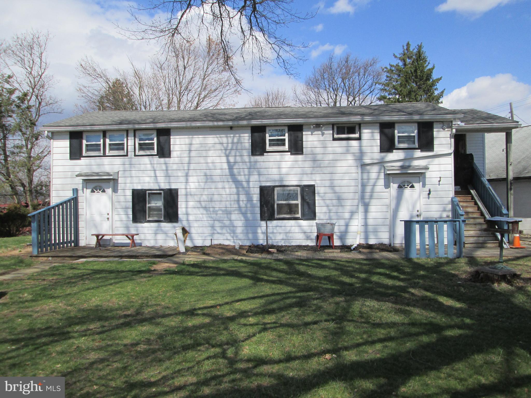 Conveniently located close to route 100 and route 663 and just north of Boyertown is where you will find this charming raised ranch home. Situated on over 1 acre with public sewer , this property has lots to offer. The main living area of the home is located on the upper floor and is accessed by a side staircase and chair lift if needed. The inviting eat in kitchen contains many large cabinets, porcelain sink, electric range, and refrigerator. The spacious living room is great for gatherings, with wall to wall carpet. The hallway leads to 3 large bedrooms and a full hall bathroom. The lower has a finished heated room formerly used as a bedroom , shower stall and sink, laundry area and lots of storage areas that could be finished into additional living areas. The rest of the property is ideal for anyone who has large toys or needs a space to tinker. The detached front 3 car garage is divided into a single bay and a separate two bay area. The detached garage in the rear also has 3 bays, but also has a woodshop area and a wood stove to provide heat. A new roof on the house, replacement windows, and a great view of the surrounding farm fields all are included. A quick closing is possible.