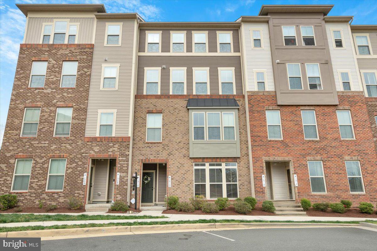 Beautiful & Spacious Townhome-Style Condo with Garage – A Must-See!
Welcome to this stunning 3-bedroom, 2.5-bathroom townhome-style condo in the highly desirable Loudoun Crossing community. With an open-concept layout, modern upgrades, and fantastic amenities, this home is designed for both comfort and convenience.

Stylish & Functional Living Spaces
As you enter, you’ll be greeted by carpeted stairs leading up to the main level, whether you're coming from the garage in the back or the front entryway. Once upstairs, the main living area boasts a seamless blend of hardwood floors and plush carpeting, creating a warm and inviting space.

The gourmet kitchen is a chef’s dream, featuring granite countertops, stainless steel appliances, a spacious island, wall oven, and a dry bar area. A screened door between the kitchen and the balcony provides just the right amount of separation while still allowing for fresh air and natural light.

Luxurious Primary Suite & Thoughtful Layout
Upstairs, the primary bedroom is a true retreat, featuring a tray ceiling, a cozy seating area, and two walk-in closets. The en-suite bath is designed for relaxation, boasting a spacious dual-faucet walk-in shower.

Two additional bedrooms offer plenty of space, with one including its own walk-in closet. The upper level also includes two linen closets, providing extra storage for all your essentials. Plus, the convenient upper-level laundry makes daily chores easier than ever!

Outdoor Living & Added Perks
Step onto your private balcony, a perfect spot to enjoy your morning coffee or tea. The driveway has recently been resealed, and there’s additional parking in the back for guests.

Resort-Style Amenities & Prime Location
Loudoun Crossing offers fantastic community amenities, including a clubhouse, exercise room, and an outdoor swimming pool during the open season. Located near top-rated schools, shopping, dining, and major commuter routes, this home provides the perfect balance of convenience and tranquility.

Extra Features That Make a Difference
✔️ All TV brackets and window treatments convey
✔️ Attached garage for secure parking and storage

This home truly has it all—don’t miss out on this incredible opportunity! Schedule your tour today and experience all that this beautiful townhome-style condo has to offer.