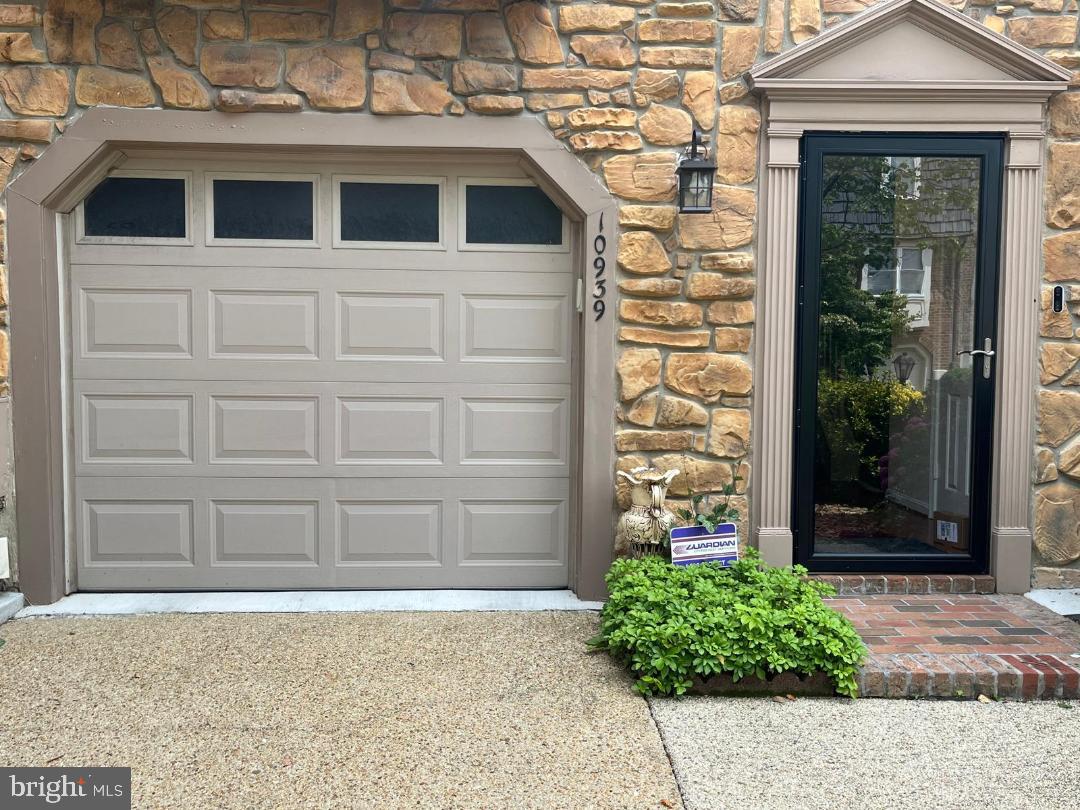 Prime Silver Spring Location! Three-level  Townhome in the sought after Glen Haven neighborhood of Silver Spring.  This quiet cul-de-sac community is Steps from the beautiful Sligo Creek Park and trail.  Attached garage with Additional Parking Pad in front of the garage.  The Entry Level features a Large Foyer with a coat closet, a Beautiful  Family Room with a cozy fireplace insert, walking out to the backyard patio. This level also includes Large Half Bath, and interior access to the garage. Sun filled  main level has an Open-Concept Floor Plan, with a Large, Sunny  Living room smoothly connecting with the Dining Area and Gourmet Kitchen. The beautiful Hardwood floors in the LR & Dining Room create a warm feel. Step out onto the deck to enjoy peaceful wooded views and a perfect spot gatherings. The chef’s kitchen stainless steel appliances, granite countertops and backsplash. A powder room and laundry closet complete this level. The upper floor has three bright bedrooms and two  full bathrooms. The primary suite  is very Large with impressive  Vaulted ceiling,  This beautiful expansive primary suite includes two huge closets The ensuite bath has oversized vanity, a skylight, and a large shower. Outdoor spaces include a deck perfect for relaxing or entertaining and a fenced backyard with a patio that offers privacy. Ideally located near parks, playgrounds, Brookside Gardens, Wheaton Ice Arena,  Library, Horseback riding trails,. Located on Major Commuter Road: University Blvd,, Veirs MIll Rd, Georgia Avenue and Columbia Pike, . Minutes to Wheaton metro and the Mall.