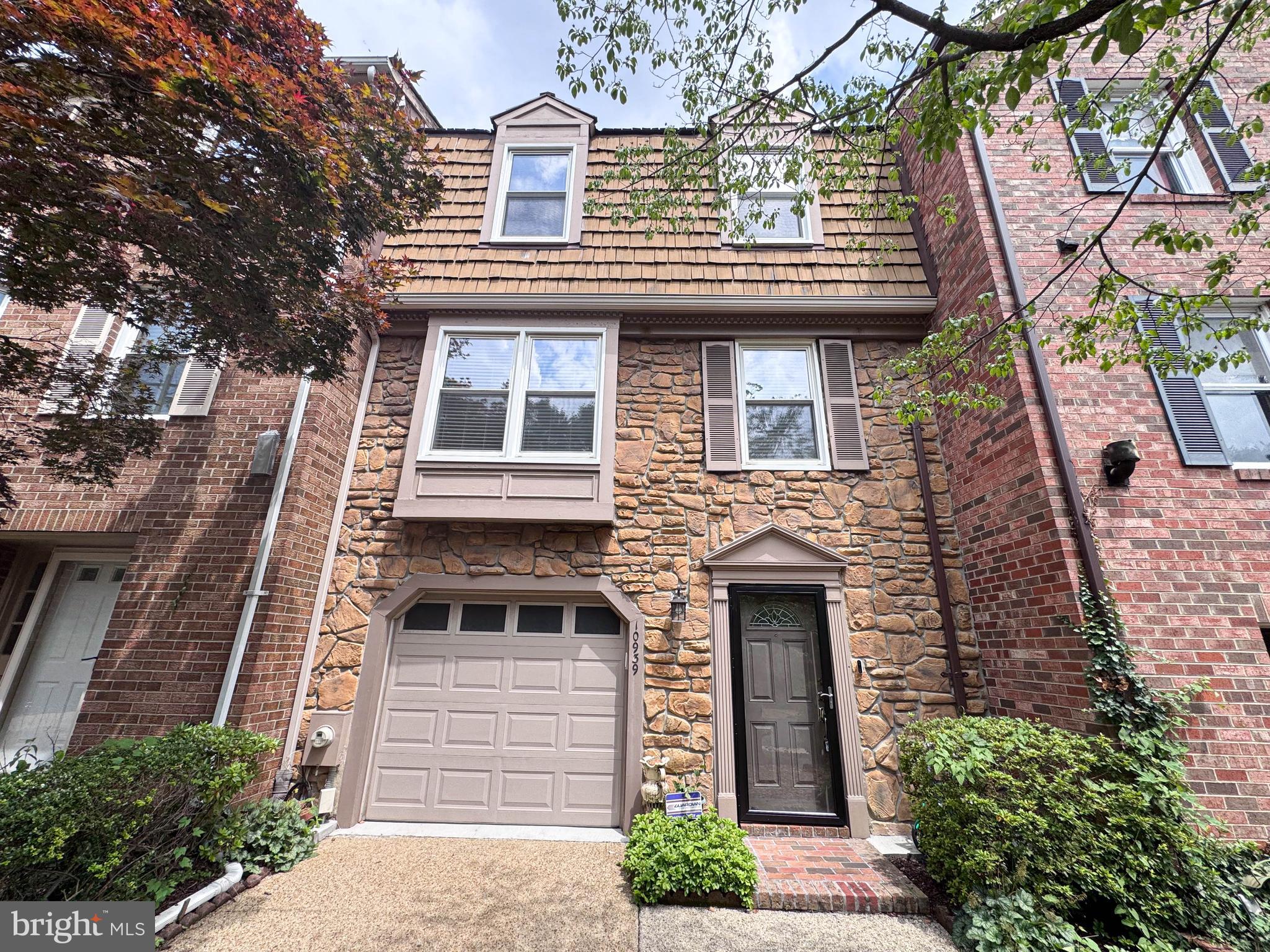 Silver Spring Location! Three-level  Townhome in the sought after Glen Haven neighborhood of Silver Spring.  This quiet cul-de-sac community is Steps from the beautiful Sligo Creek Park and trail.  Attached garage with Additional Parking Pad in front of the garage.  The Entry Level features a Large Foyer with a coat closet, a Beautiful  Family Room with a cozy fireplace insert, walking out to the backyard patio. This level also includes Large Half Bath, and interior access to the garage. Sun filled  main level has an Open-Concept Floor Plan, with a Large, Sunny  Living room smoothly connecting with the Dining Area and Gourmet Kitchen. The beautiful Hardwood floors in the LR & Dining Room create a warm feel. Step out onto the deck to enjoy peaceful wooded views and a perfect spot gatherings. The chef’s kitchen stainless steel appliances, granite countertops and backsplash. A powder room and laundry closet complete this level. The upper floor has three bright bedrooms and two  full bathrooms. The primary suite  is very Large with impressive  Vaulted ceiling,  This beautiful expansive primary suite includes two huge closets The ensuite bath has oversized vanity, a skylight, and a large shower. Outdoor spaces include a deck perfect for relaxing or entertaining and a fenced backyard with a patio that offers privacy. Ideally located near parks, playgrounds, Brookside Gardens, Wheaton Ice Arena,  Library, Horseback riding trails,. Located on Major Commuter Road: University Blvd,, Veirs MIll Rd, Georgia Avenue and Columbia Pike, . Minutes to Wheaton metro and the Mall. Pictures will be on Later Tonight  Delayed Do to Power Outage. Open Tomorrow Sun July 12th,  1  to 4.