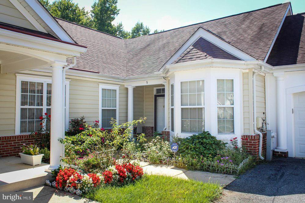 Cameron Grove is a beautiful 55+ gated community featuring many amenities.  Gorgeous 2BR/2B villa with an open floor plan. Huge master bathroom and walk-in closet. Spacious kitchen with bay window, extra cabinet space and huge pantry.  LR has a gas fireplace.  W/D with utility sink. W/W carpet.  Drapery rods and curtains. Enclosed seasonal sun room (HVAC) with a ceiling fan.