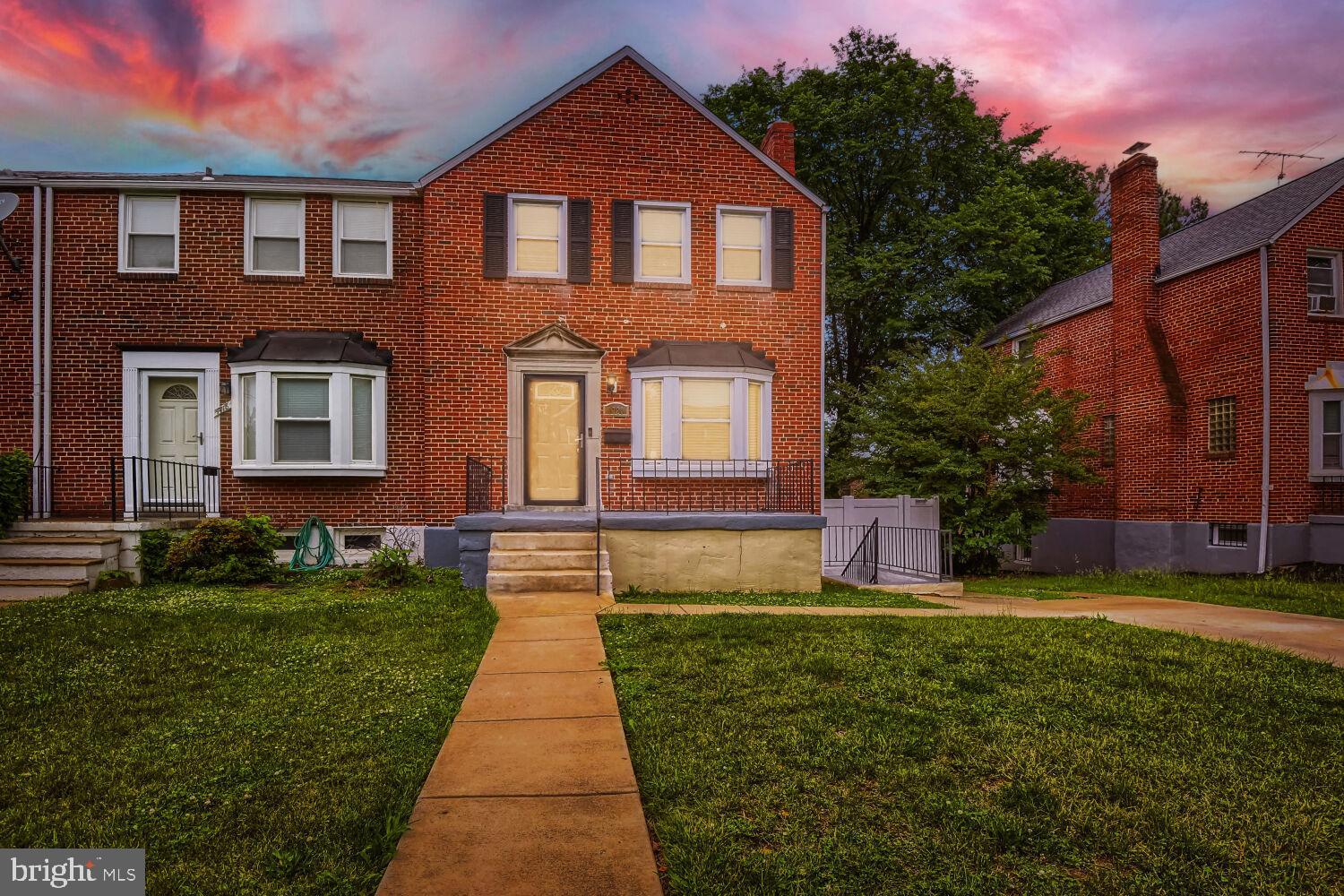 Welcome home to this move-in ready end-of-group brick townhome in the heart of Northeast Baltimore! Enjoy relaxing on the spacious front porch and the convenience of a private 2-car driveway. Inside, the bright living room features a charming bay window, flowing into a formal separate dining room perfect for entertaining. The updated kitchen offers timeless white shaker cabinets, granite countertops, stainless steel appliances, white subway tile backsplash, and a center island with seating. A convenient main level laundry/mud room adds extra functionality and everyday ease.

The upper level includes 3 comfortable carpeted bedrooms with ceiling fans, serviced by a full hall bath with tub/shower combo and tile surround. The huge fully finished lower level provides even more living space with a 4th bedroom and full bath ideal for guests, a home office, or recreation area. Outside, enjoy the nice flat rear yard with plenty of space for entertaining, gardening, pets, or play.

Conveniently located near shopping, dining, parks, and major commuter routes including I-695 and I-95, this home offers easy access to downtown Baltimore, Towson, and Morgan State University. A great combination of space, updates, and location!
