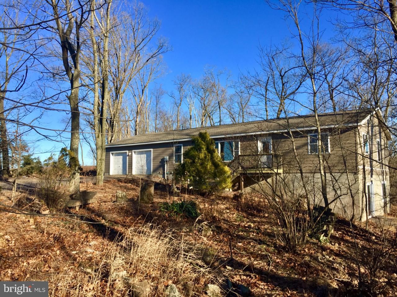 Don't miss this secluded, open floor plan, almost like new ranch, off of Blue Mountain Road, with breathtaking views.This custom home features bamboo  flooring, oak kitchen with granite counter tops. Two bedrooms, with their own full bath, an exceptional bonus room off of the master bedroom, that could be your private office, study, TV room or 3rd bedroom.  The full unfinished walkout basement, gives you plenty of room for future growth.  Call today for your private showing.