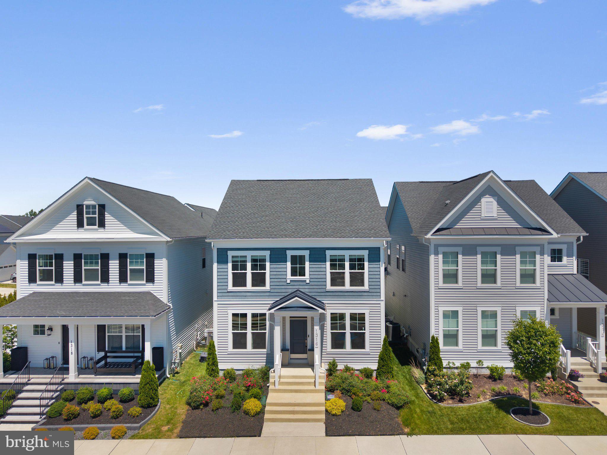 Welcome to 1316 Heron Rookery Way, a beautiful home located in the sought-after Two Rivers community in Odenton, MD!

Built by Michael Harris Homes, this spacious residence offers 5 bedrooms, 3.5 bathrooms, a dedicated home office, and a versatile floor plan designed for modern living. Floor-to-ceiling windows fill the home with natural light, creating a bright and inviting atmosphere throughout.

The gourmet kitchen features stainless steel appliances, a gas stove, a center island and space for gathering, entertaining and everyday living. Recessed lighting, generous living areas, and stylish finishes add to the home’s appeal.

Upstairs, you’ll find spacious bedrooms, a convenient second-floor laundry room, and a primary suite designed for comfort and relaxation. A custom closet system provides additional organization and storage.

The finished lower level adds even more living space with a renovated basement featuring a bedroom, full bathroom, and plenty of room to entertain, host guests, or enjoy movie nights.

Life in Two Rivers is what truly sets this property apart. Residents enjoy resort-style amenities, community events, walking trails, pools, fitness facilities, playgrounds, and more—all conveniently located near Baltimore, Annapolis, Fort Meade and Washington, DC.

If you’re looking for a home that offers space, modern convenience and an exceptional community lifestyle, 1316 Heron Rookery Way is ready to welcome you home.