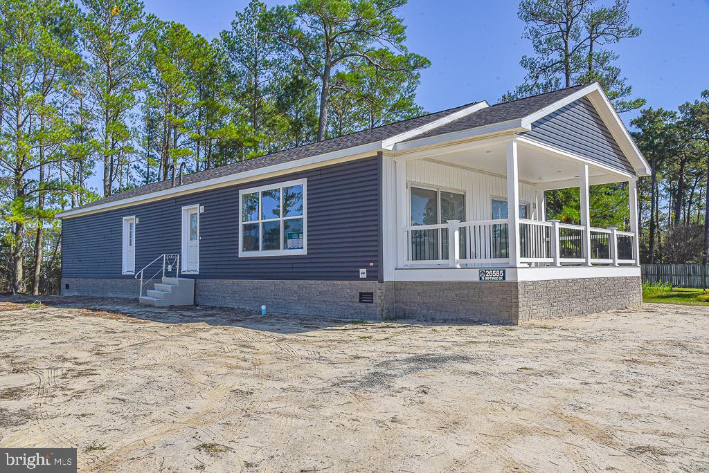 This 4 bedroom/ 2 bath new construction home is located at the front of the Coveside Community and is just steps away from the playground and tennis & basketball courts! Featuring a covered front porch to enjoy watching all of the activities and a view of the water from the back of the home! The kitchen provides a large island with sink and hi rise spring faucet. The pendant lighting and natural lighting keep the home bright and welcoming.


The lot can accommodate a 24' x 24' garage that is not included in the price. Speak with one of our sales consultants to discuss pricing on the garage and any additional features you would like to make this home yours!

Coveside is a delight for those who love to boat and fish! Easy access to the Rehoboth Bay from the docks and ramps throughout the community! Playgrounds, tennis courts, and beautiful waterfront areas are just moments from your doorstep in the Pot-Nets Coveside community. Enjoy a unique combination of seclusion and convenience at your new home in Coveside. Come see your new home today!

*This is a spec home that has recently been set, and is under construction. Please be mindful of this when viewing.