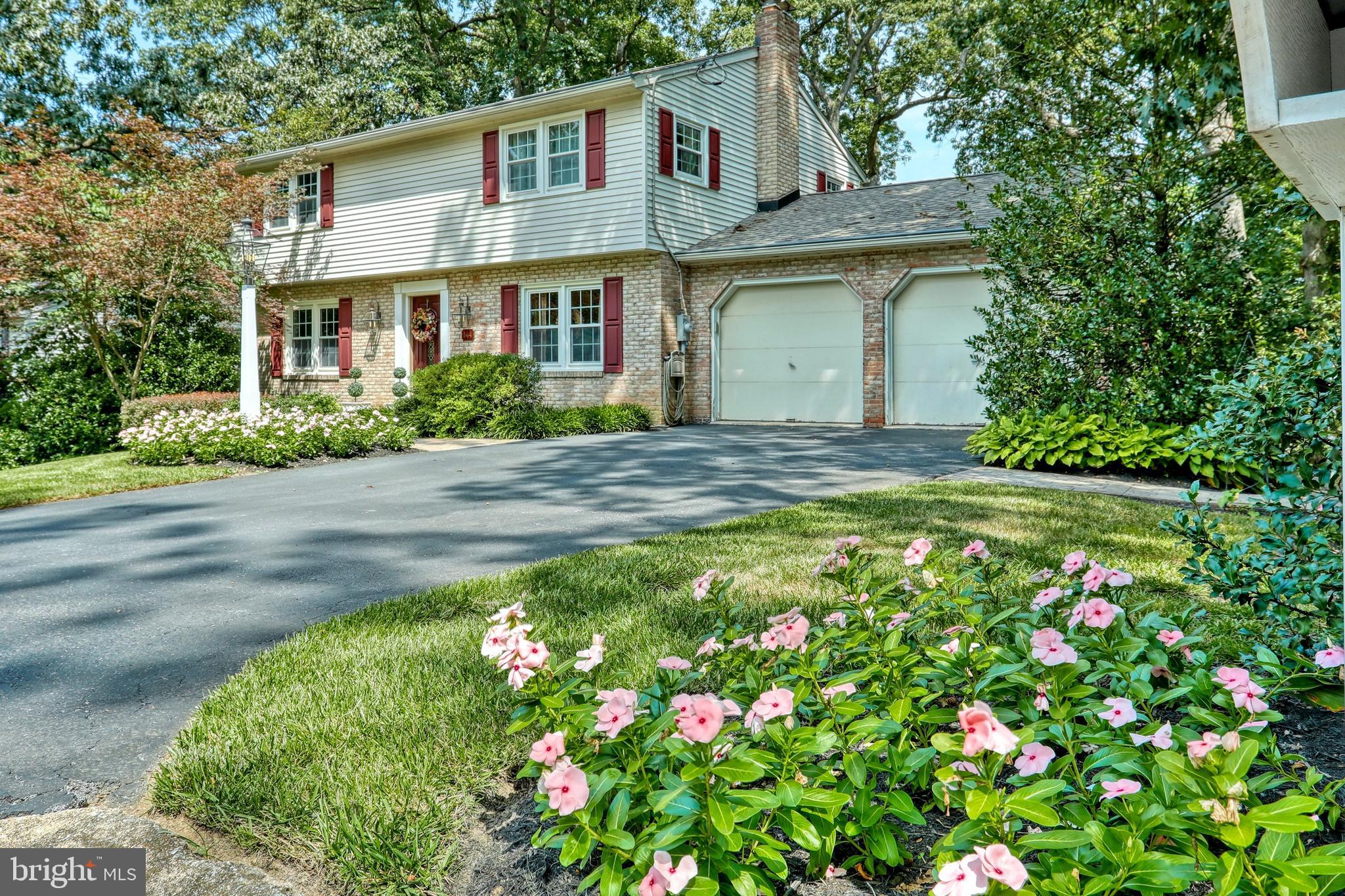 Don't miss out on an opportunity to own a beautiful home in Dallastown School District  with easy access to I-83, shopping and restaurants. This home is  an entertainer's  dream.  Updated kitchen has a massive granite counter-top island that can seat 6+ people and includes a Wolf cook-top, Sub-Zero refrigerator, wall oven/microwave, warming drawer, 5 burner gas stove and custom hood vent. Neutral colors and Brazilian cherry hardwood floors lead you out to a large  deck overlooking the beautiful private back yard where you can enjoy your morning coffee and barbecues. The main floor provides an open dining, office, living room combination with vaulted ceilings and plenty of windows. Upstairs the master bedroom opens up to your own on-suite bathroom and plenty of closet space.  Two additional ample size bedrooms include large closets to accommodate growing families or extra guests.  It gets even better once you enter the walk out level basement. Downstairs is a large family room with a gas fireplace and beautiful laminate floors, game room, exercise room, laundry room, workshop with garage door for easy backyard access.  The  exposed basement has french doors that lead directly out into the stamped concrete patio with fountain and steps leading to the front.  The backyard is secluded and has beautiful grass and shade and plenty of room for a pool or games!   Enjoy your own backyard oasis while being only minutes away from  everyday conveniences.  This home is move-in ready and will not disappoint you with all of its room and extra features!