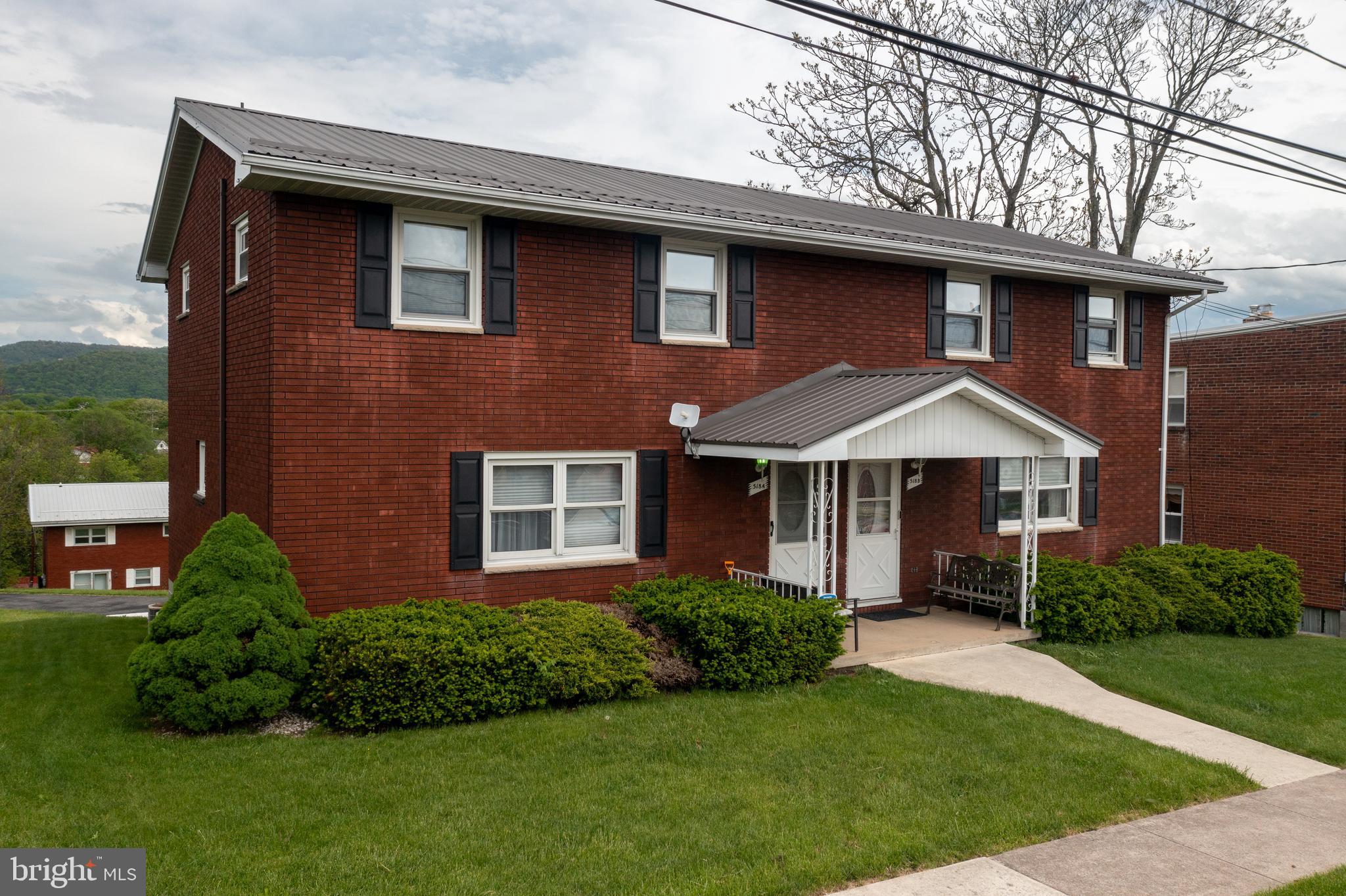 MOVE-IN READY TOWNHOUSE RIGHT AROUND THE CORNER FROM UPMC WESTERN MARYLAND, ALLEGANY COLLEGE AND PUBLIC SCHOOLS! Looking for an investment property? Or a full time home close to work? Welcome to 518 A Avondale Avenue. This brick townhouse offers 3 bedrooms and 1.5 bathrooms. The main level features a living room, an eat-in kitchen and a half bath. Upstairs, there are three bedrooms and a full bathroom. Hardwood floors through-out. The basement is unfinished with a laundry area and a one-car garage. Directly across the street from Fort Hill High School and walking distance to Washington Middle School and Constitution Park. Minutes from the hospital, college and I-68. Sale only includes 518 A (left hand side).