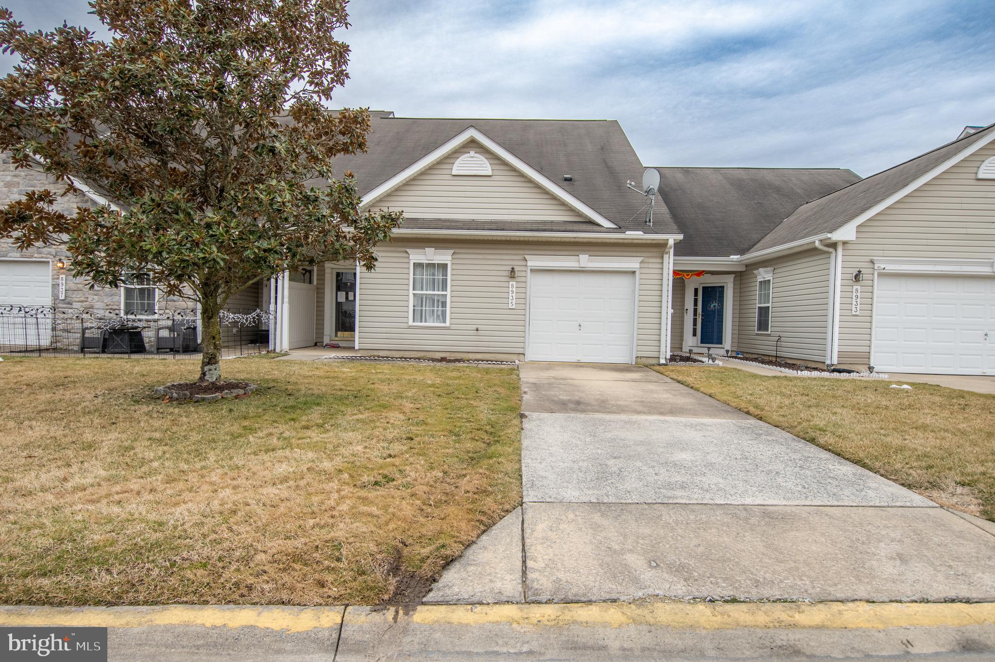 Welcome to this 2-bedroom, 2-bath home located in the desirable Wood Creek Golf Community in Delmar, MD. This home offers comfortable, low-maintenance living with a spacious layout and great natural light throughout.

Step inside to find an open-concept living area with soaring ceilings, creating a bright and airy feel. The kitchen features ample cabinetry, generous counter space, and a breakfast bar that opens to the main living area—perfect for entertaining or everyday living. Just off the living space, enjoy access to the rear of the home with views of the community.

The primary suite offers a private bath and walk-in closet, while the additional bedroom and full bath provide space for guests, family, or a home office. Upstairs, a large loft area overlooks the main living space, offering flexible space for a second living room, office, or recreation area.

Additional features include a laundry room, attached garage, and ample storage throughout the home.

Located in the Wood Creek Golf Community, residents enjoy a beautifully maintained neighborhood centered around golf and outdoor living. Community amenities include a golf course, clubhouse, swimming pool, and walking paths, providing an active and social lifestyle.

Conveniently located near Salisbury, shopping, dining, and major routes, this home offers the perfect combination of comfort, convenience, and community living.

Schedule your private showing today and see all that Wood Creek has to offer!