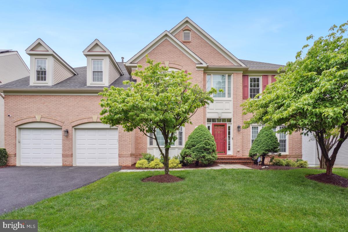 Welcome to this exceptional 5-bedroom, 4.5-bathroom residence in the coveted Bells Mill Estates.
Brimming with curb appeal and featuring a thoughtfully designed open floor plan, this stunning home offers the perfect blend of elegance and comfort for modern living. Step through a grand two-story foyer onto gleaming hardwood floors that flow seamlessly throughout the main level. Flanking the staircase are the formal living and dining rooms, both showcasing elegant crown molding, oversized windows, and abundant natural light. A set of French doors leads to a sunlit study, complete with extensive built-in bookcases—ideal for a home office or library. At the heart of the home is a spacious gourmet kitchen, outfitted with stainless steel appliances, granite countertops, two-sided glass cabinets, and a central island offering additional storage. The adjacent breakfast area overlooks the private backyard and opens to the expansive deck, creating a warm and inviting space for everyday dining and entertaining. The step-down family room, open to the kitchen, features dramatic floor-to-ceiling windows with curved transoms and French doors that lead directly to the deck—perfect for seamless indoor-outdoor living. A stylish powder room and convenient access to the two-car garage complete the main level. Upstairs, you'll find four generously sized bedrooms and three full bathrooms, plus a full-sized laundry room. The luxurious primary suite offers beautiful natural light, a custom walk-in closet, an expansive sitting room,  a spa-like en-suite bath with dual vanities, a Jacuzzi tub, and a glass-enclosed shower. A second bedroom enjoys its own private en-suite bath, while the third and fourth bedrooms share a well-appointed Jack-and-Jill bathroom with separate vanity spaces. The fully finished lower level adds incredible flexibility with a fifth bedroom, full bath, and spacious multi-use area—ideal for a media room, home gym, or playroom. Two large storage rooms provide ample space for organization and convenience. Located just minutes from top-rated schools, shopping, and major commuter routes, this home is a rare gem in a vibrant and welcoming community. Updated with new windows and doors! Don’t miss your chance to call it home—schedule your private showing today!