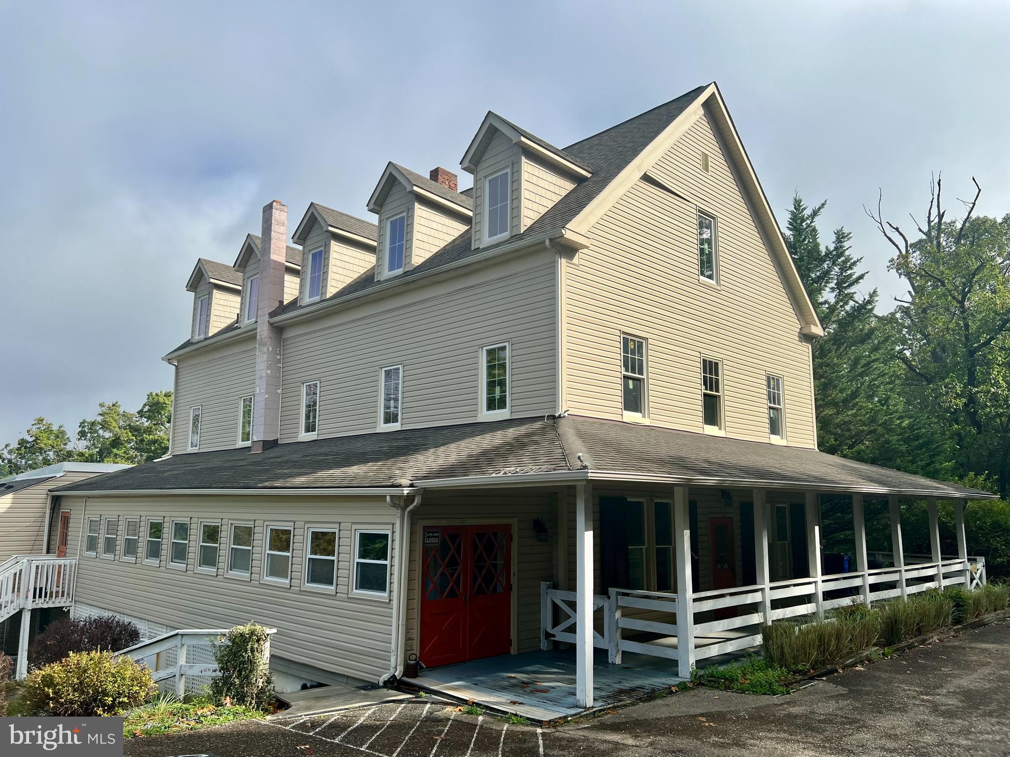 This property presents a good opportunity for investor and/or user. Flexible VC zoning allows multiple uses. Five accessory apartment generates approx. $50,000 annual gross revenue. The property is formerly the Braddock Inn.  Commercial kitchen is in place with hood. Property will require work and is being sold in "As-Is" condition. Parking for 40+ vehicles.
