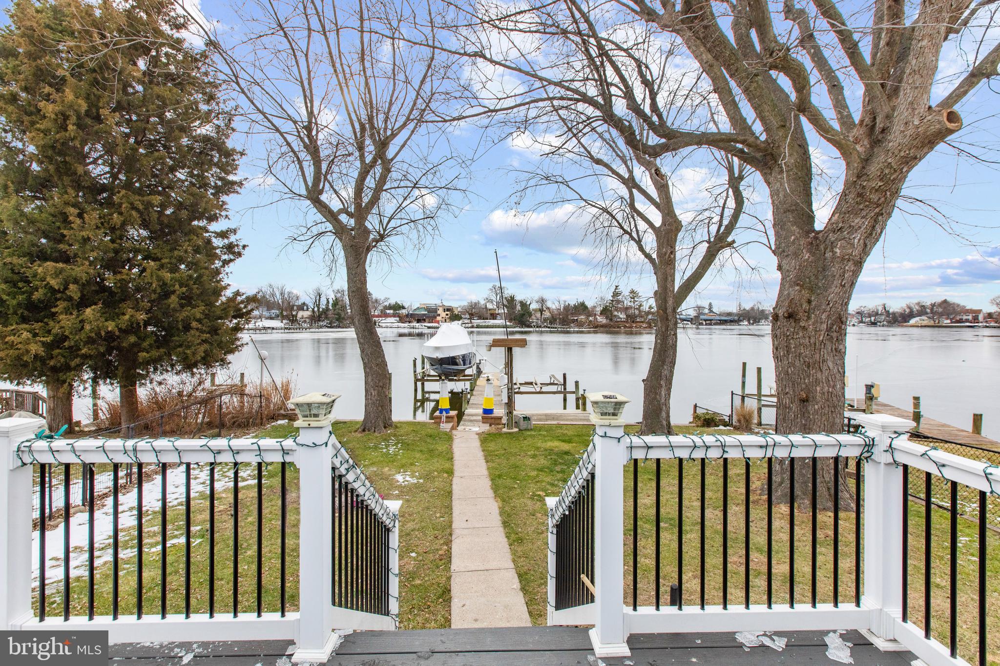 Waterfront Living Awaits You on Bear Creek! 
Welcome to a truly remarkable waterfront retreat! This stunning, property offers the perfect blend of modern comfort and nautical charm. With breathtaking water views and direct access to the creek, you’ll feel like you're on vacation every day.
 Property Highlights:
50' Private Pier: Ideal for boating, fishing, or simply enjoying the serene waterfront setting.
Modern Updates Throughout: Every detail has been thoughtfully upgraded for style and convenience.
Brand-new Kitchen cabinets and countertops
Stainless steel appliances, including a new dishwasher and microwave; Perfectly designed for cooking and entertaining. Interior Features
Main Level Primary Suite: Sliding glass doors lead to a Trex deck—your front-row seat to colorful sunsets!
Gorgeous updated ensuite bathroom for a spa-like experience. Lofted Second Bedroom/Den & Third Bedroom: Both offer water views from the second level.
Second Full Bathroom: Conveniently located on the main level, perfect for guests and family.
Details You’ll Love: Wood Floors: Warm and inviting, flowing throughout the main level.
Nautical Decor: Thoughtfully curated to bring out the coastal charm.
Whether you’re hosting gatherings on the spacious deck, enjoying the tranquil pier, or cozying up indoors, this Bear Creek gem is the epitome of waterfront living.
Owner will consider shorter than 12 month lease for additional $/month. Non-smokers only. Pets considered on a case by case basis. List price is unfurnished. Property can be rented furnished as well.