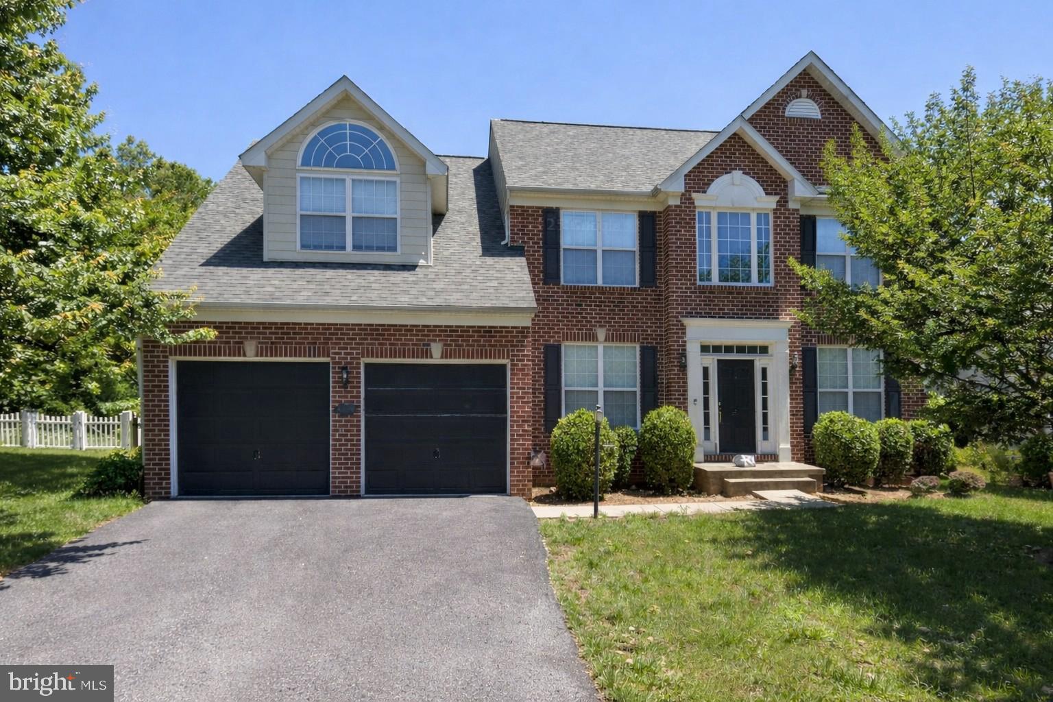 BACK ON THE MARKET!!! Buyer’s contingencies expired which is your opportunity!!! THIS HOME HAS ALREADY MADE IT THROUGH THE INSPECTION AND APPRAISAL PROCESS!  JUST SUBMIT YOUR OFFER AND MOVE RIGHT IN!!!  
Beautiful 4-bedroom, 4.5-bath brick-front home with a 2-car garage in the sought-after CANAL RUN community, offering over 4,700 TOTAL square feet of living space and situated on a premium $25,000 upgraded wooded lot with a stream behind the home. 
This bright, open floor plan features 9-foot ceilings and a spacious family room with a cozy gas fireplace that creates a warm and inviting atmosphere. The sunroom bump-out adds additional light-filled living space for a casual meal and overlooks the wooded backyard and 1,000 square foot concrete patio with electrical rough-ins. 
Upstairs, retreat to the luxurious 765 square foot primary suite featuring two seating areas—perfect for reading and relaxing—along with a large walk-in closet and spacious en suite bath. Three additional generously sized bedrooms share two full bathrooms, one with double sinks, one with a single sink, providing plenty of space for family and guests. 
The finished basement offers a large recreation room ideal for entertaining, playing pool (pool table negotiable), or movie nights, along with a full bath, a potential 5th bedroom or private office, plumbing for a future bar area, and space for a possible theater room. 
Step outside to your massive patio with electricity, perfect for entertaining, relaxing, and enjoying peaceful wooded views. 
Recent updates provide both comfort and peace of mind, including a NEW roof (2019), gas hot water heater (2 years old), BRAND NEW carpeting throughout all bedrooms, hallway, and stairs (March 2026), NEW LVP flooring (2025) in the living room, dining room, and office, and a NEW stove, microwave, and dishwasher. 2 years NEW front-loading washer and dryer on MAIN level. 
Ideally located just minutes from the MARC Train for an easy commute, and only 15 minutes to Frederick, MD or Leesburg, VA, with convenient access to shopping, dining, recreation, and major commuter routes. This home truly has it all—space, money saving updates, classic charm, and an unbeatable location. Don’t wait—schedule your showing before this one is gone!