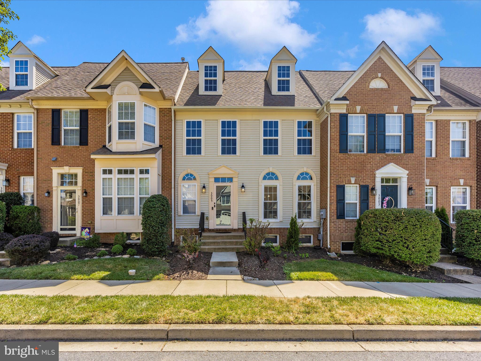 Welcome to a one-of-a-kind living experience in the Mill Island section of the esteemed Worman's Mill community. This unique four-level townhome boasts distinctive features and luxurious amenities, making it the epitome of modern living.

Step inside the alcove foyer entryway and be greeted by the grandeur of the two-story foyer, adorned with gleaming hardwood floors and showcasing a curved staircase and signature arched doorways characteristic of Wormald homes. To the right, a shared formal living/dining room space awaits, currently serving as a home office—a versatile area that adapts to your lifestyle needs.

Pass through to the spacious galley-style kitchen, where maple cabinets, stainless steel appliances to include a gas stove, and granite counters create a chef's paradise. Tons of cabinet and counter space make it perfect for family gatherings, while a cozy morning room off the kitchen offers a tranquil space to enjoy your morning coffee bathed in natural light.

Adjacent to the kitchen, the family room beckons with a gas fireplace, creating a warm ambiance for chilly days and nights. This room is also accessible from the main hall, where a half bath and entry to the lower level complete the main floor layout.

Ascend the hardwood curved staircase to the upper level, where convenience meets luxury with an upper-level laundry room—a coveted feature in any home. To the right of the staircase, two generously sized spare bedrooms share a full bath, while the rear of the home boasts a large primary suite with cathedral ceilings.

But the highlight of the primary suite is the unique fourth level loft—a private retreat ideal for a home office or relaxation space. A primary bath with soaking tub, separate shower, and huge walk-in closet complete this dream suite.

Venture down to the lower level, where entertainment awaits in the large rec room—perfect for a pool table or family movie nights. Additional rooms offer versatility, with options for a home office or guest quarters, complemented by a full bath.

Outside, the fully fenced rear yard features a paver patio for low-maintenance living, ideal for summer cookouts and outdoor enjoyment. A detached garage in the rear provides convenient parking with entry from the alleyway behind the home.

Welcome home to the Worman's Mill community, where amenities abound—from a community pool and clubhouse to nearby stores, restaurants, and more. Experience the epitome of modern living in this exceptional townhome—schedule your showing today!