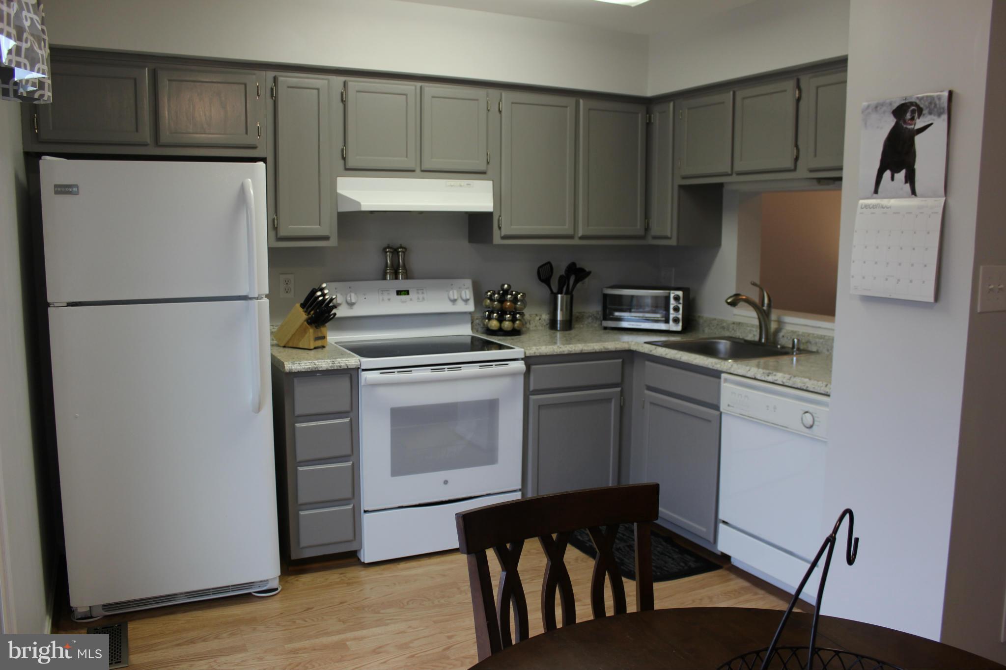 Lovely townhome in convenient location.  This home boasts cleanliness.  Freshly painted with an updated kitchen.  Rare basement to enjoy extra living space.  Spacious bedrooms upstairs.  Enjoy the quiet evenings on the deck with complete privacy.