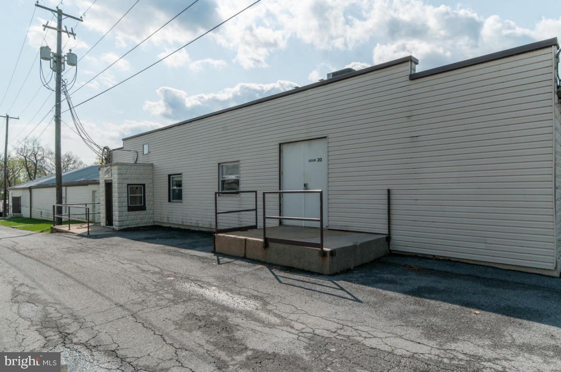 I'm pleased to present this 22,926 SqFt. free standing building available for immediate purchase. The building situated on 1.7 acres with full public utilities, built masonry block, concrete and wood flooring. Property currently consists of office and warehouse space with outside storage on site. Excellent location minutes to 222, 772 and 272.