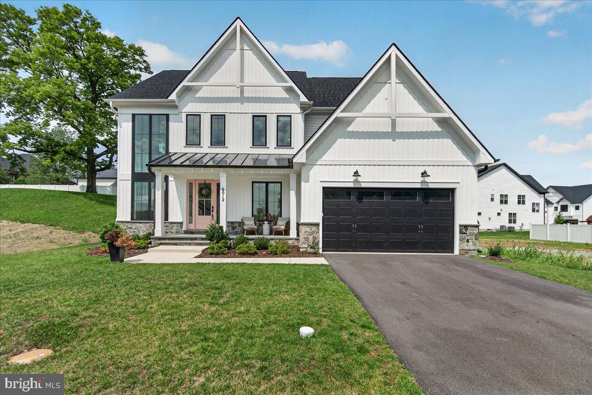 Picture perfect living starts here!  Built by the highly respected local builder Wormald Homes, this stunning Beckham model offers the perfect blend of timeless design, luxury finishes, and everyday functionality. Boasting over 5,300 square feet of beautifully living space, this sought-after floor plan is loaded with premium upgrades and exceptional attention to detail. The heart of the home is a gourmet chef’s kitchen featuring an oversized quartz center island, high-end finishes, and an open layout that flows seamlessly into the spacious family room and the bright, inviting sunroom—perfect for entertaining or relaxing with family. Luxury vinyl plank flooring extends throughout the main living areas, complemented by numerous custom upgrades that truly set this home apart. With 5 spacious bedrooms and 4.5 beautifully appointed bathrooms, there is room for everyone. The fully finished lower level is designed for both recreation and relaxation, offering a large rec room, stylish wet bar, hobby room, exercise room, and a private bedroom and full bath suite—ideal for guests or multi-generational living. Situated on a premium lot with exceptional privacy and plenty of usable outdoor space, this home provides the perfect setting for both entertaining and everyday enjoyment. Meticulously maintained and in like-new condition, this incredible home is conveniently located near major commuter routes, shopping, dining, and top local amenities. Luxury. Space. Location. This is one you won’t want to miss.