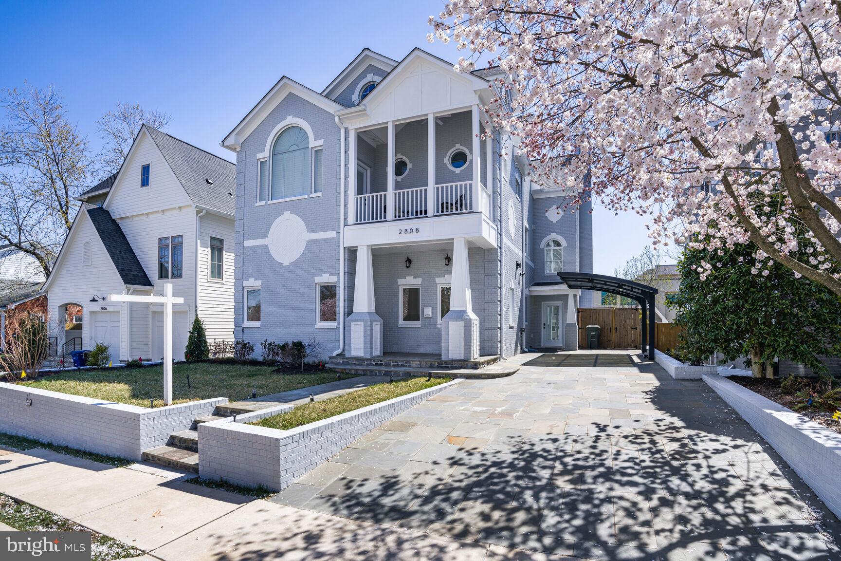 Discover a meticulously remodeled Colonial in the heart of Lyon Park with an unparalleled location. Offering an impressive 4,645 square feet of refined interior space and an additional 530 square feet of outdoor living.  This distinguished residence seamlessly blends timeless charm with modern luxury. Every detail has been thoughtfully curated, from the gourmet chef’s kitchen outfitted with high-end appliances to the secondary kitchenette in the upper-level recreation room—perfect for effortless entertaining. The home boasts two opulent primary bedrooms, each with a spa-inspired ensuite bathroom. Multiple family rooms on both the main and upper levels provide an abundance of space for relaxation and gatherings. Additionally, a detached studio space, complete with a full bathroom and mini kitchenette, presents endless possibilities—whether as a home office, guest suite, or potential ADU.