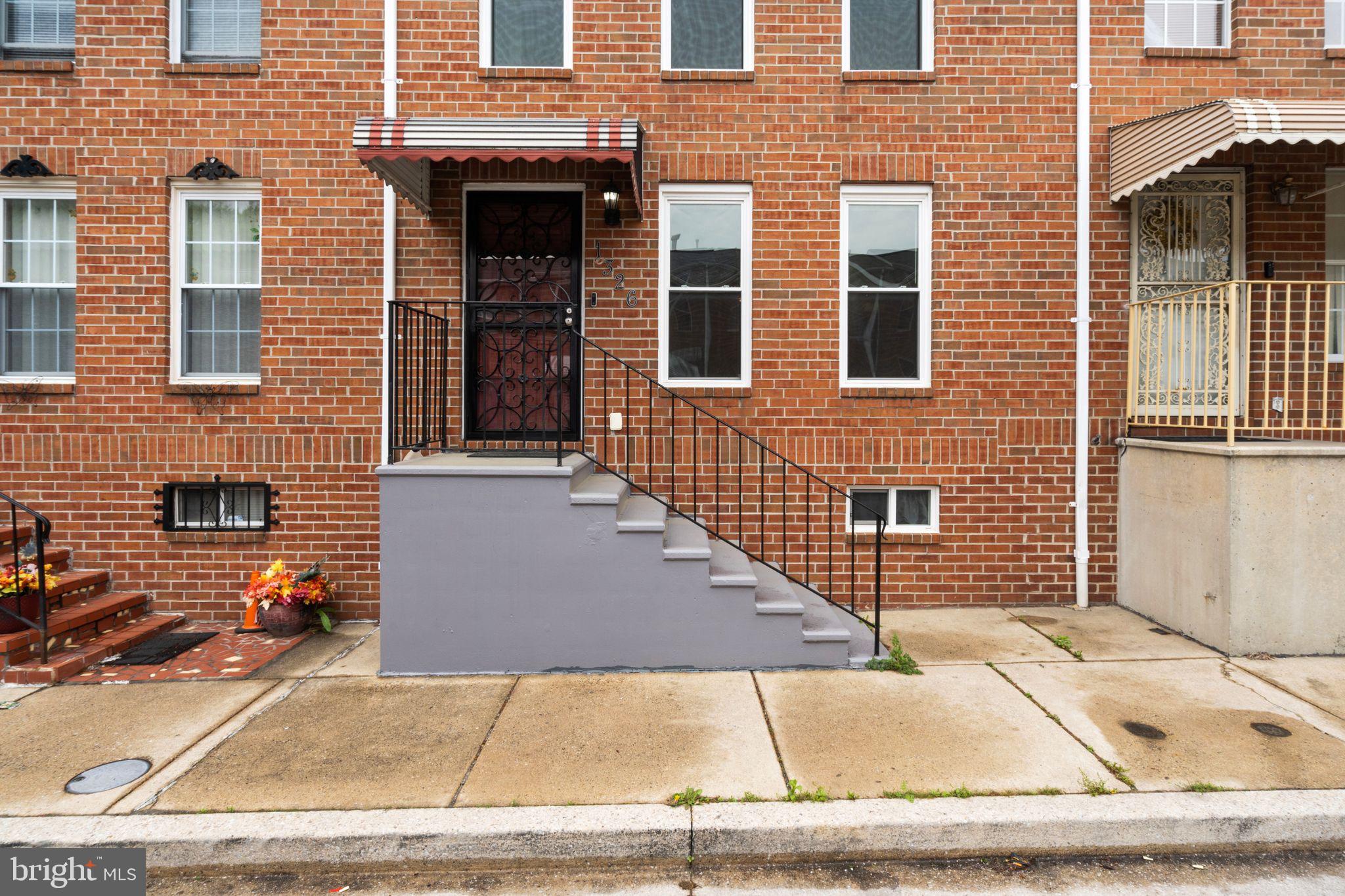 Renovated townhouse offering four spacious bedrooms and two full bathrooms. The main level boasts stunning hardwood floors, while the upper level features plush new carpet and a generous primary bedroom complete with its own private bath. The finished basement adds a bonus bedroom — perfect as an additional living space or a private retreat. Head outside to enjoy your own patio area, ideal for evening relaxation. Conveniently located near popular Baltimore attractions, dining, and entertainment. SECTION 8 VOUCHERS  WELCOMED!  Schedule your tour today!