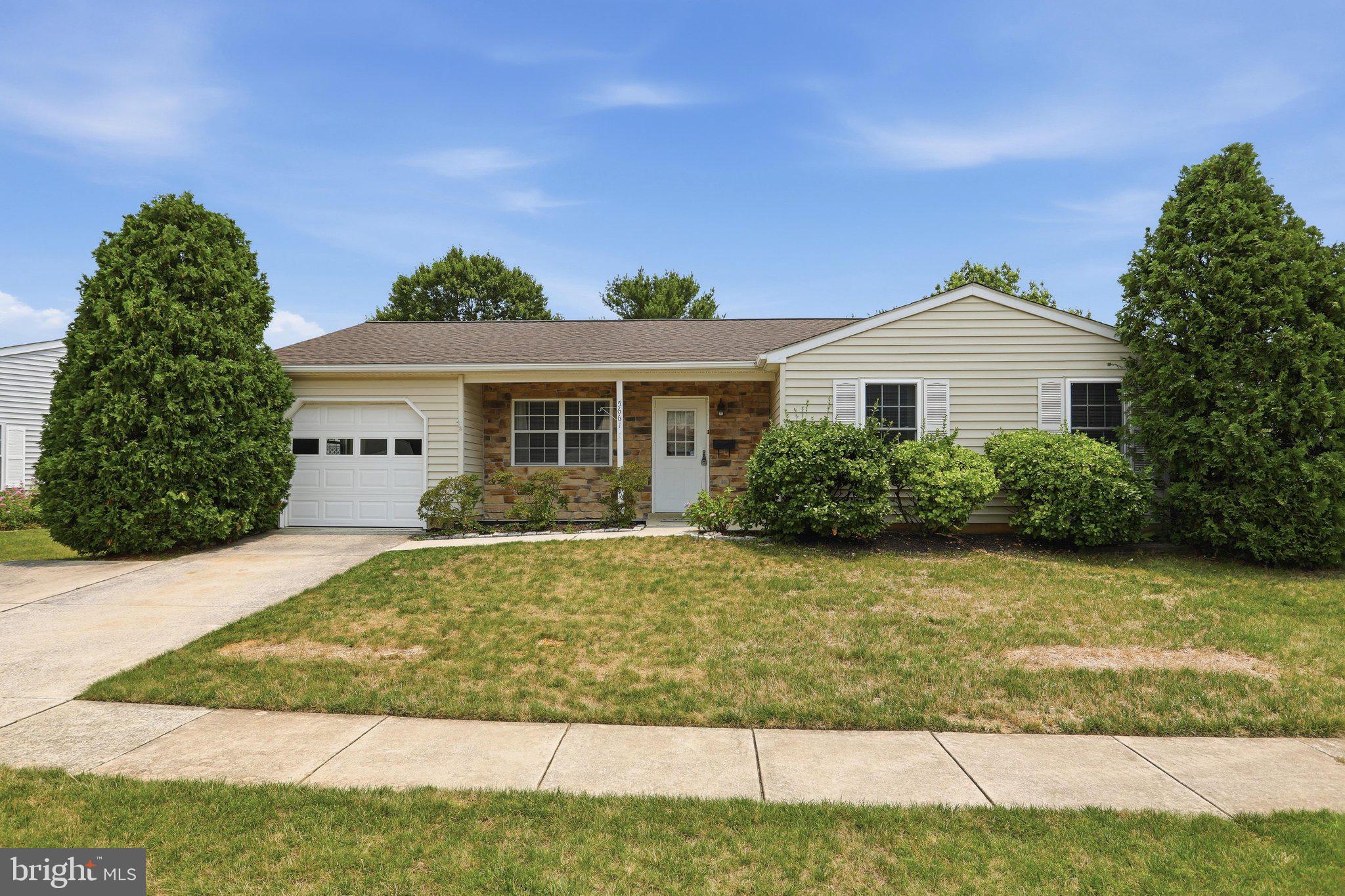 We heard your feedback and the Seller took action and has installed a Brand New Roof, Sliding glass door, painted the entire house and added very nice quality LVP floors throughout. Nothing left for you to do but move in!

Welcome to 5661 Crabapple Drive in the sought-after 55+ Crestwood Village community—where comfort meets easy living.

This move-in ready 2-bed, 2-bath home features a bright, open layout with a sun-filled den, spacious living and dining area, and a kitchen with newer stainless-steel appliances. Enjoy your morning coffee on the front porch or relax on your private back patio.

The primary bedroom offers double closets, while the second bedroom and full hall bath are perfect for guests. A washer and dryer are included, plus a one-car garage for parking, storage, or hobbies.

Enjoy low-maintenance living with lawn care and snow removal included, along with fantastic village-style amenities like a clubhouse, pool, fitness center, and courts for tennis, pickleball, and more. Conveniently located near shopping, dining, parks, Downtown Frederick, and major commuter routes.