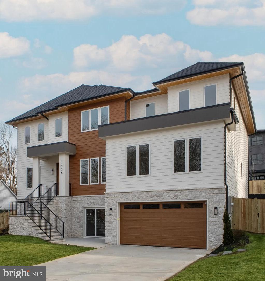 NEW IMPROVED PRICE! OPEN HOUSE SUNDAY JULY 12th,  FROM 12.00 PM to 2.00 PM.  A STUNNING, ONE-OF-A-KIND MASTERPIECE YOU WON’T WANT TO MISS! CLOSE TO METRO!
 ELEVATOR ON ALL LEVES,  BEDROOM EN SUITE ON MAIN LEVEL,  SPACIOUS FIRST FLOOR WITH 2 FAMILY ROOMS ,  4 TANDEM CAR GARAGE. Come experience the beauty, charm, and unique features this exceptional property has to offer. 

This newly completed custom home by Bella Home Construction offers over 7,600 square feet of well-planned living space in a quiet McLean location. Unlike most new construction, it includes a private elevator serving all three levels, a true main-level bedroom suite, and a layout designed for long-term flexibility and multi-generational living.

The home features 6 bedrooms, 6 full bathrooms, and 2 half baths, with wide-plank European oak flooring throughout all levels, 10-foot ceilings on the main floor, and 9-foot ceilings on the upper and lower levels. Every material and finish was selected with daily living in mind—elevated, durable, and timeless rather than purely decorative.

The main level stands out as a distinct showpiece, offering over 600 square feet of additional entertaining space—an exceptional and rarely found feature in new homes. Two separate family/living areas allow for larger gatherings, flexible furniture layouts, or elegantly formal and casual spaces. A private office includes custom built-in bookshelves and French doors. The dining area is enhanced by a butler’s pantry with sink and built-ins, along with a wood accent wall that adds warmth and definition without excess ornamentation.

The kitchen is designed for functionality, with a large central island, walk-in pantry, and direct connection to the dining and family spaces. Large sliding glass doors open to a covered porch and expansive deck, creating a natural indoor–outdoor flow. The flat, fully landscaped backyard was carefully planned to maximize natural light and support outdoor activities and everyday use.

Upstairs, the owner’s suite includes a sitting area with fireplace, spa-inspired bathroom with heated floors, a large glass-enclosed shower, soaking tub, and oversized walk-in closets. Three additional en-suite bedrooms provide privacy and comfort. The oversize laundry room is equipped with a large-capacity washer and dryer, sized for a household of this scale.

The walk-out lower level adds meaningful living space, including a private bedroom suite, large recreation room with fireplace, theater room, studio or gym, mini kitchen/bar, and a mudroom with a dog shower.

Completing the home is an oversized four-car tandem garage with EV charging capability, another feature rarely offered in new construction.

This home was thoughtfully designed to address common limitations found in many new builds—limited main-level living, lack of entertaining space, undersized garages, and layouts that fail to adapt over time.

Private tours with the builder are available by appointment. 

Conveniently located near West Falls Church Orange Line Metro and Mclean Silver Line stations with easy access to I-495, I-66, GW Parkway, Route 7, Route 123, and Dulles Toll Road. Close to Tysons Corner, Tysons Galleria, Capital One Hall, Wolf Trap, and Great Falls National Park.