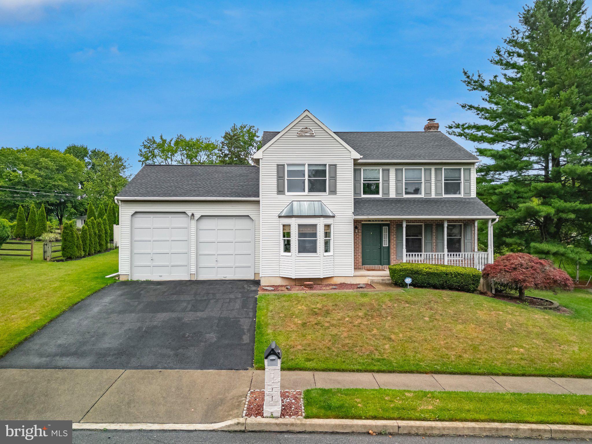 Welcome home to this well maintained colonial offering over 3,000 square feet of finished living space on a quiet cul de sac in Bethlehem Township. The main level is incredibly spacious and features hardwood floors, a formal dining room with a three-panel bay window, a spacious family room, and an open kitchen with granite countertops, a center island, stainless steel appliances, gas cooking, tile backsplash, and a bright breakfast area surrounded by a beautiful bow window overlooking the backyard. The adjoining living room is anchored by a floor to ceiling brick wood burning fireplace and opens to the rear deck. On the 2nd level the primary suite features a walk-in closet and private en suite bath, while 3 additional bedrooms provide plenty of space for family or guests. The finished basement offers nearly 900 square feet of additional living space perfect for recreation, hobbies, or a home gym. Additional highlights include first-floor laundry, an oversized garage with a 12.5-foot door clearance, a covered front porch, active radon mitigation system, new 50-year warrantied roof, and new hot water heater. Conveniently located near shopping, dining, and all major roadways.