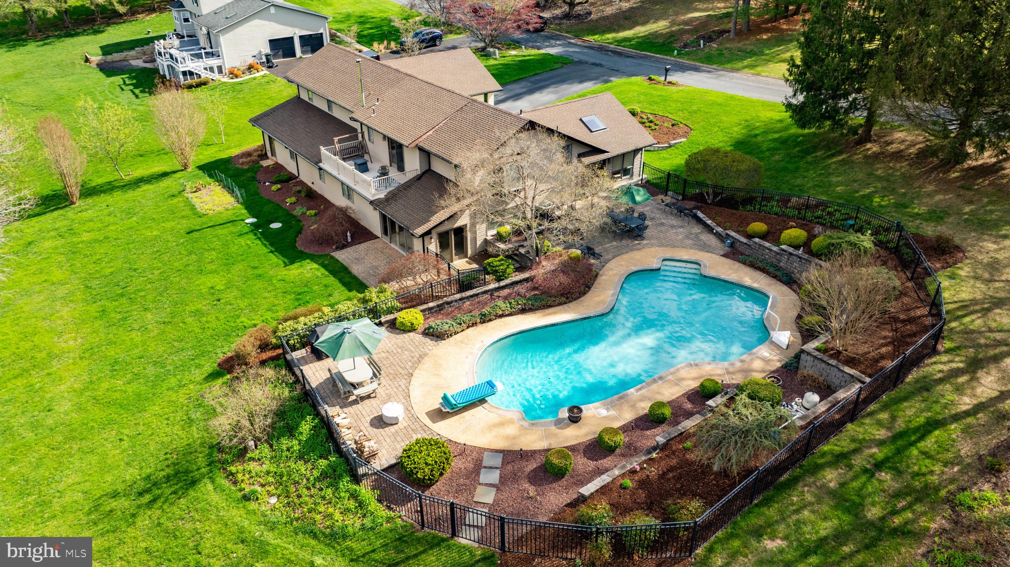 Welcome to your Private oasis!..Professional photographs avail. 4/10!... OPEN HOUSE Sat 4/12 & SUN 4/12 - 12-2pm!!...This spacious 5-bedroom raised rancher style home sits on nearly 1 acre of beautifully landscaped land, offering the perfect blend of comfort, space, and outdoor entertainment!
The open floor plan features generous living and dining areas, Gourmet island kitchen  with natural light throughout! Step outside to your own backyard retreat- complete with a sparkling swimming pool, expansive patio  & perennial gardens. Finished Lower Level offers an in-law suite w/BD , Full BA & walk-out. Second Level offers 2 Primary suites with private full BAs!....Peace of mind as homeowners have well maintained this home w/energy efficient updated systems, & exterior recently repainted for impressive curb appeal! TOP RATED Schools-this property is a rare find and move-in ready in time for Summer Pool enjoyment!