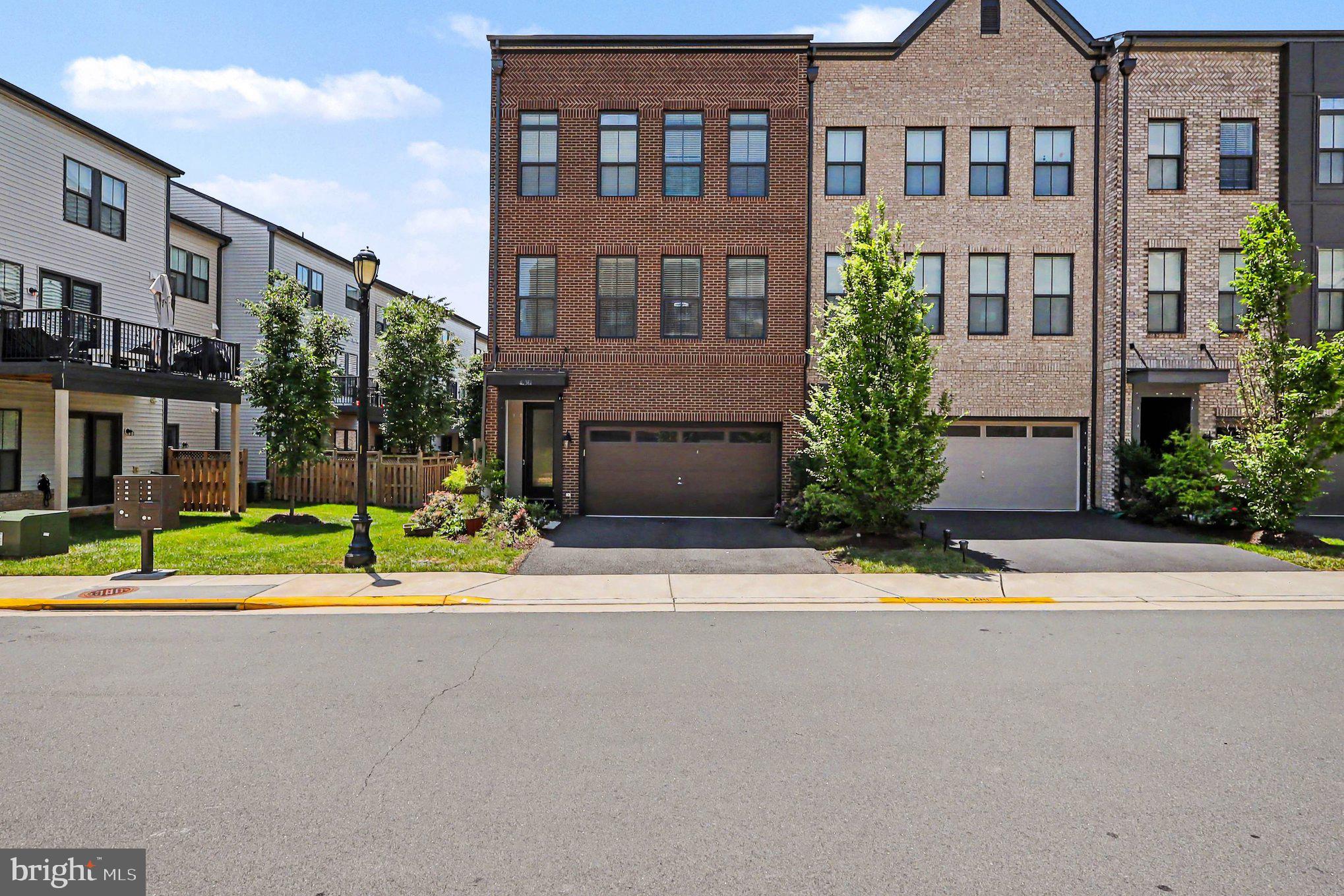 Welcome to 42361 Vancouver Ter, an exquisite 2020-built townhome offering 3,168 square feet of refined living in the heart of Brambleton. Soaring high ceilings, expansive windows, and a spacious two-car garage set the tone for this sophisticated residence from the moment you arrive. The main level features an elegant, open-concept layout  perfect for upscale entertaining with generous living and dining areas that flow seamlessly into a gourmet kitchen ready for your finest finishes and décor.

With 2 full baths and 2 half baths thoughtfully appointed across three levels, this home is designed for both comfort and convenience. The upper level offers tranquil bedroom retreats and spa-like baths, while the lower level provides a luxurious flex space ideal for a recreation room or additional entertainment space. Enjoy resort-style Brambleton amenities, such as pools, parks, trails, shops, dining, and easy access to major commuter routes, while coming home to a nearly new property that delivers a truly elevated, move-in ready lifestyle.