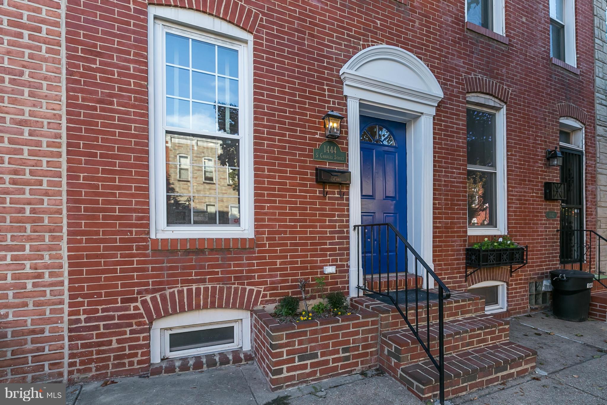 This home has 3 large BR's on the upper levels, as well as 2 full baths. Everything you are looking for: stainless appliances, hardwoods, exposed brick, recessed lighting, patio, wet bar, & a large roof deck w/fantastic views!  2nd fl laundry & great storage in bsmt.  Fantastic Fed Hill location close to restaurants, Circulator & downtown. Priced below market value for under $300,000. Nice!