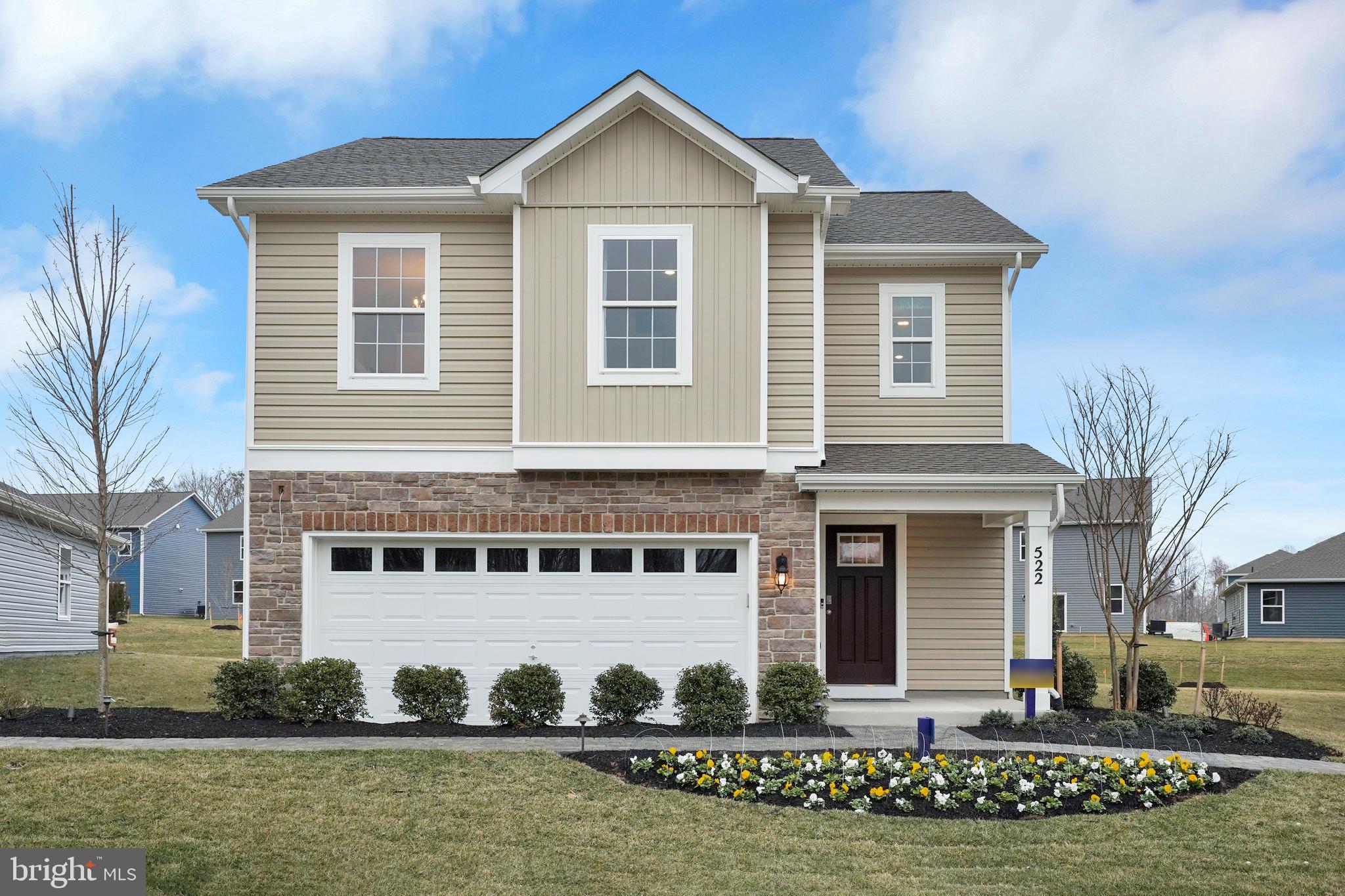Pinegrove is a master planned community of new homes situated on over 1,021 acres of land. Threaded among stream valleys and mature forest, this highly sought after community features wooded homesites and will have endless amenities for an active lifestyle. The Cabral floor plan features 3 bedrooms, 2 1/2 bathrooms, an upstairs loft and a two car garage. As you make your way from the front porch into the foyer you will find a convenient first-floor powder room and coat closet. Past the foyer is the large, open concept living room that flows nicely into the eat-in kitchen that overlooks the casual dining area and a sliding glass door for easy access to the backyard. Offering an abundance of natural light, the welcoming kitchen comes with modern cabinetry, a granite island with enough room for seating, an impressive walk-in corner pantry and stainless-steel appliances. Upstairs, the owner’s suite is the retreat you have been looking for! The spacious bedroom, ample walk-in closet and oversized owner’s bath with its luxurious shower are all must-see. The entire family will be able to have their own space with the two additional large bedrooms, hall bathroom and expansive open loft upstairs. The laundry room is centrally located upstairs along with a hall linen closet. This home is also equipped with smart home technology, featuring a keyless entry, Skybell (video doorbell), programmable thermostat to adjust your temperature from your smartphone and much more. Commuting and traveling is made easy with close-proximity to Routes 301 and 6. This lifestyle driven community is just minutes from the St. Charles Towne Center with shopping and restaurants close by.