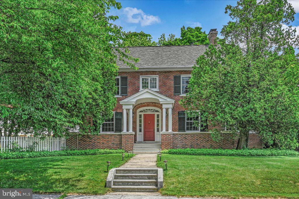 The relaxing atmosphere in this quiet community will immediately be noted upon arrival
to this two-story, all-brick colonial home with a two-car garage and upper-level storage.
The beautiful fenced-in backyard allows for a variety of activities that can occur on the
landscaped lawn or on the L-shaped wooden deck perfect for a fire pit or grilling. A wide
porch in the front of the house provides another location to enjoy the outdoors. When
entering the house, the new ceramic floor in the mudroom provides an opportunity to
hang a coat without fear of tracking dirt on the perfectly maintained hardwood floors. In
the spacious kitchen, there is new vinyl flooring and windows, a dazzling backsplash
and a breakfast nook tucked in the corner for family meals. Another option for meals is
just steps away in the formal dining room. In the open living room cooled by central air,
a window seat offers opportunities for gazing outside or reading a book pulled from the
built-in bookshelves. French doors are the gateway into the cheerful sunroom. The
second floor remains impressive as there is a continuation of the beautiful hardwood
floors, a bright bathroom at the top of the stairs, and four bedrooms with a breathtaking
balcony extending from one. Before leaving the house, the finished basement and
adjacent laundry room should be explored. A one-year home warranty included this charming home will not last long. Call
to schedule an appointment today.
