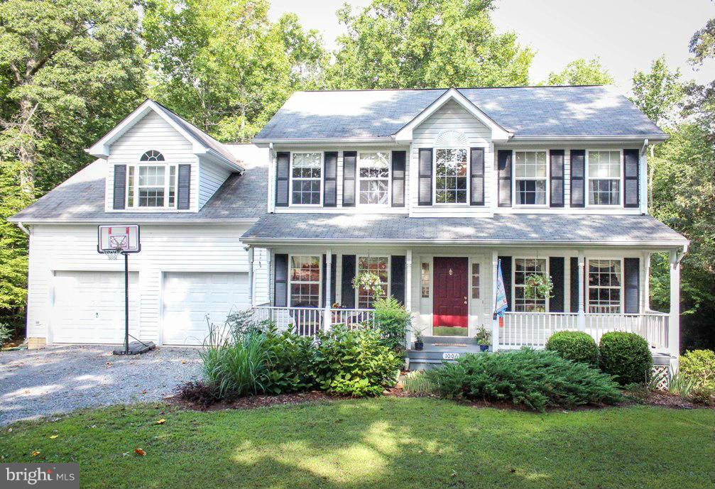 Sellers Have found home of choice! This house has it all. 5 bedrooms, 3.5 baths, Quality Built Home on .76 acre. Formal living and dining rooms, family room, hardwood floors throughout. NEW KITCHEN  Master bedroom with sitting area and spa feel bathroom. Finished basement with rec room, hobby/office room and guest room with bath. Composite deck overlooks wooded privacy. 2 car garage nice level lot